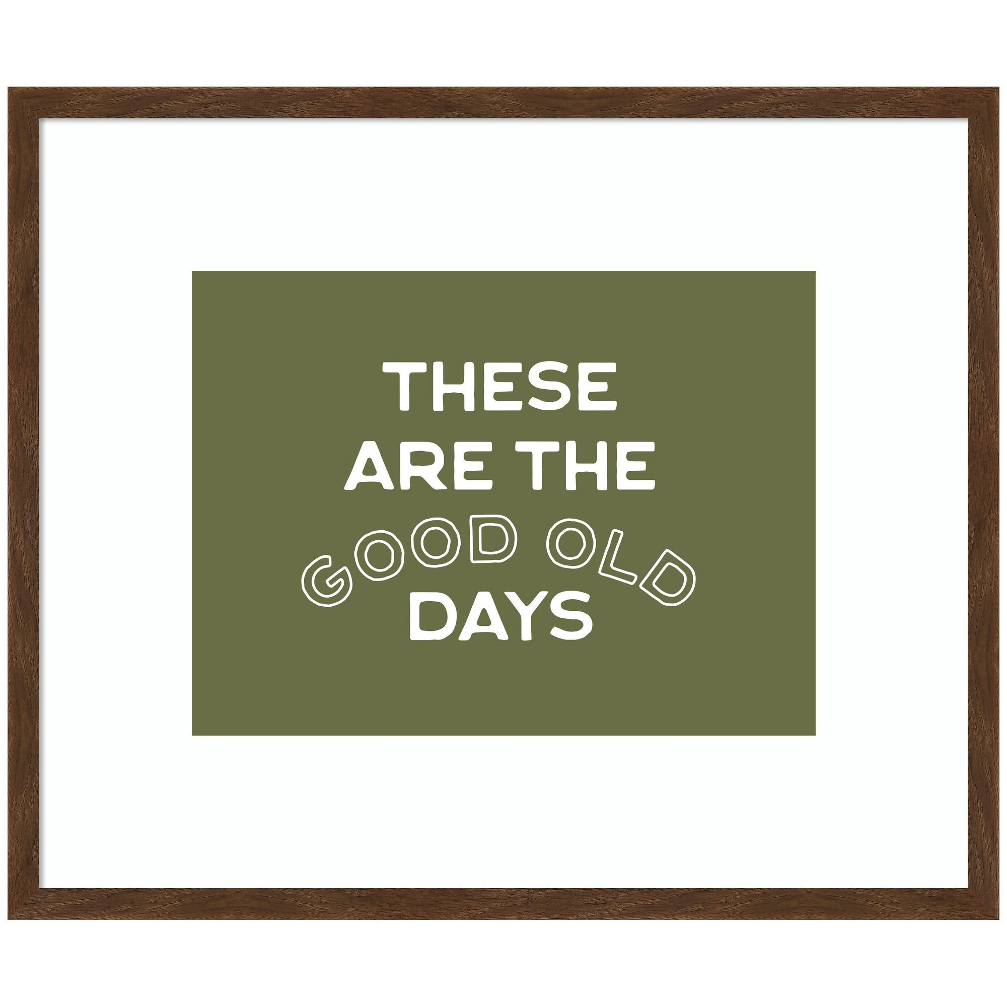 Framed wall art print titled 'These Are the Good Old Days' with stamped sage green lettering in a Carlisle Brown Narrow frame