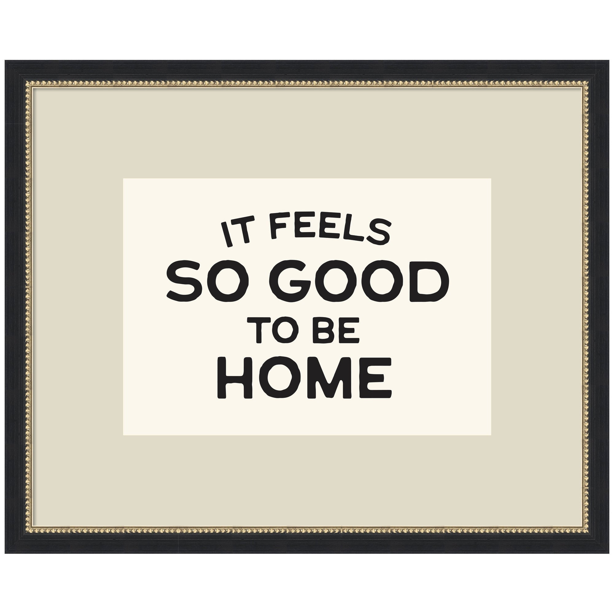 Framed black and white typography art print reading 'It Feels So Good to be Home' by Lucky Guava