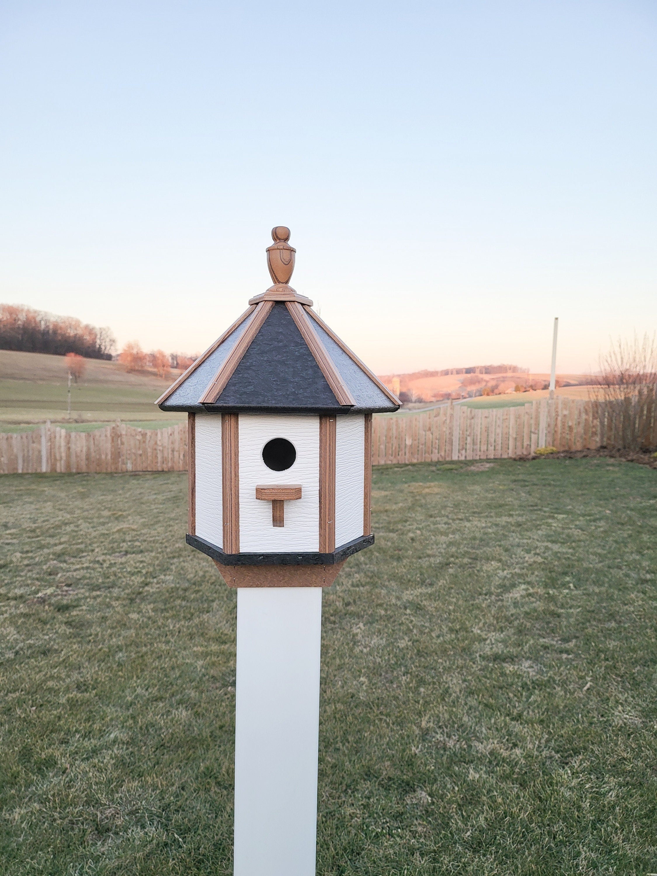 Handcrafted Amish poly birdhouse with one hole, shown mounted outdoors