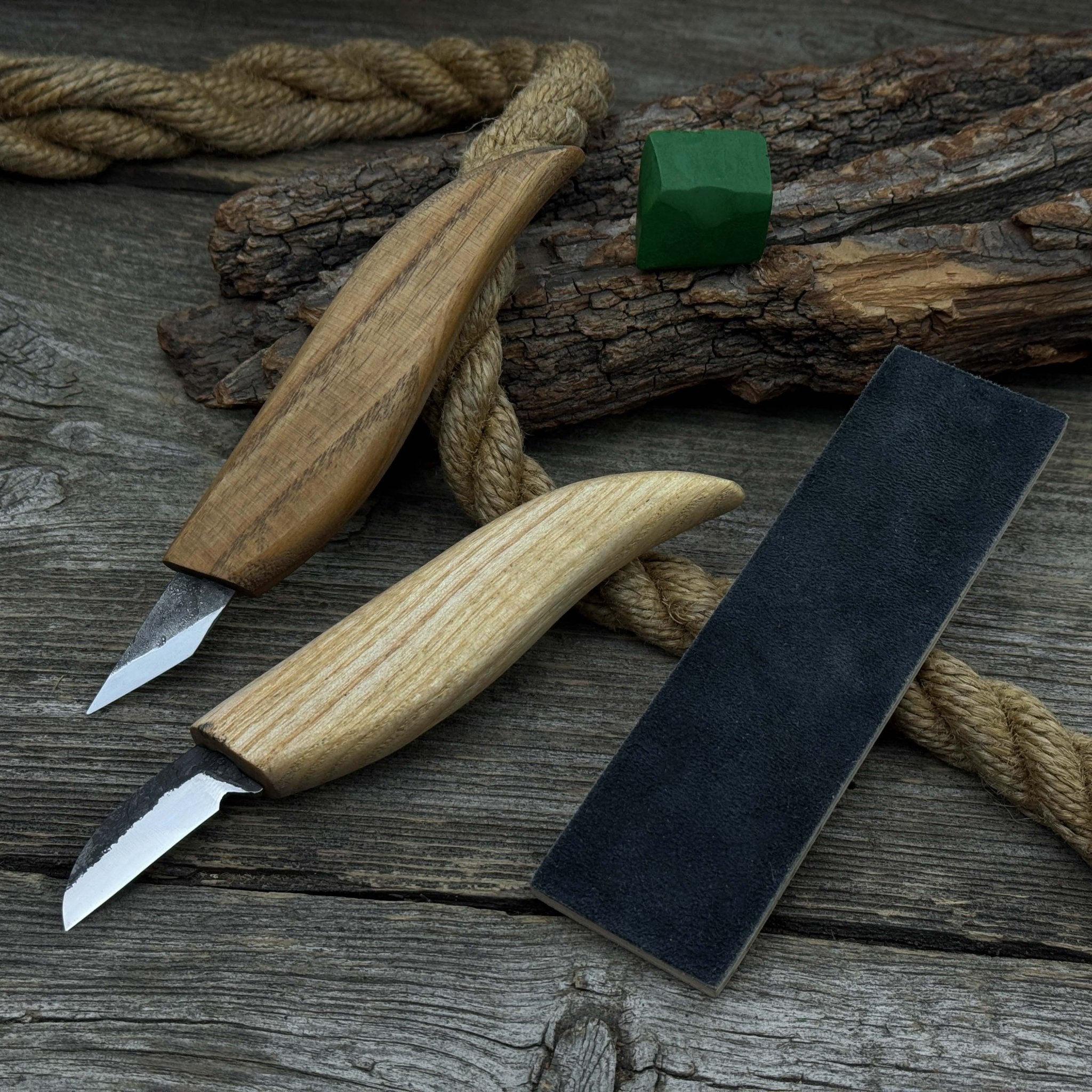 2-piece wood carving knife set with leather strop by Sharky Forged Steel Tools showing ash wood handles and high-carbon steel blades