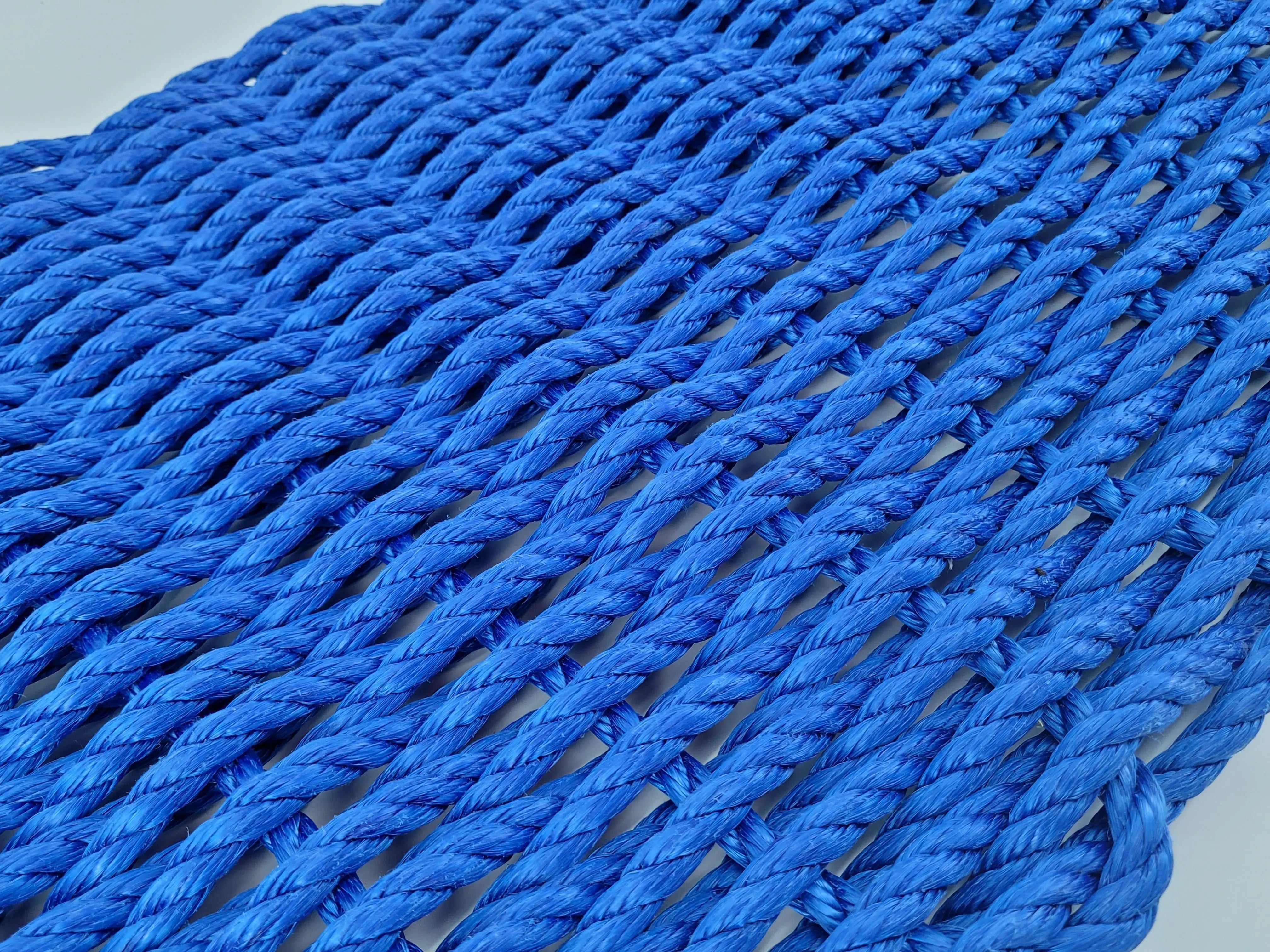Handmade solid color rope door mat in various colors and sizes