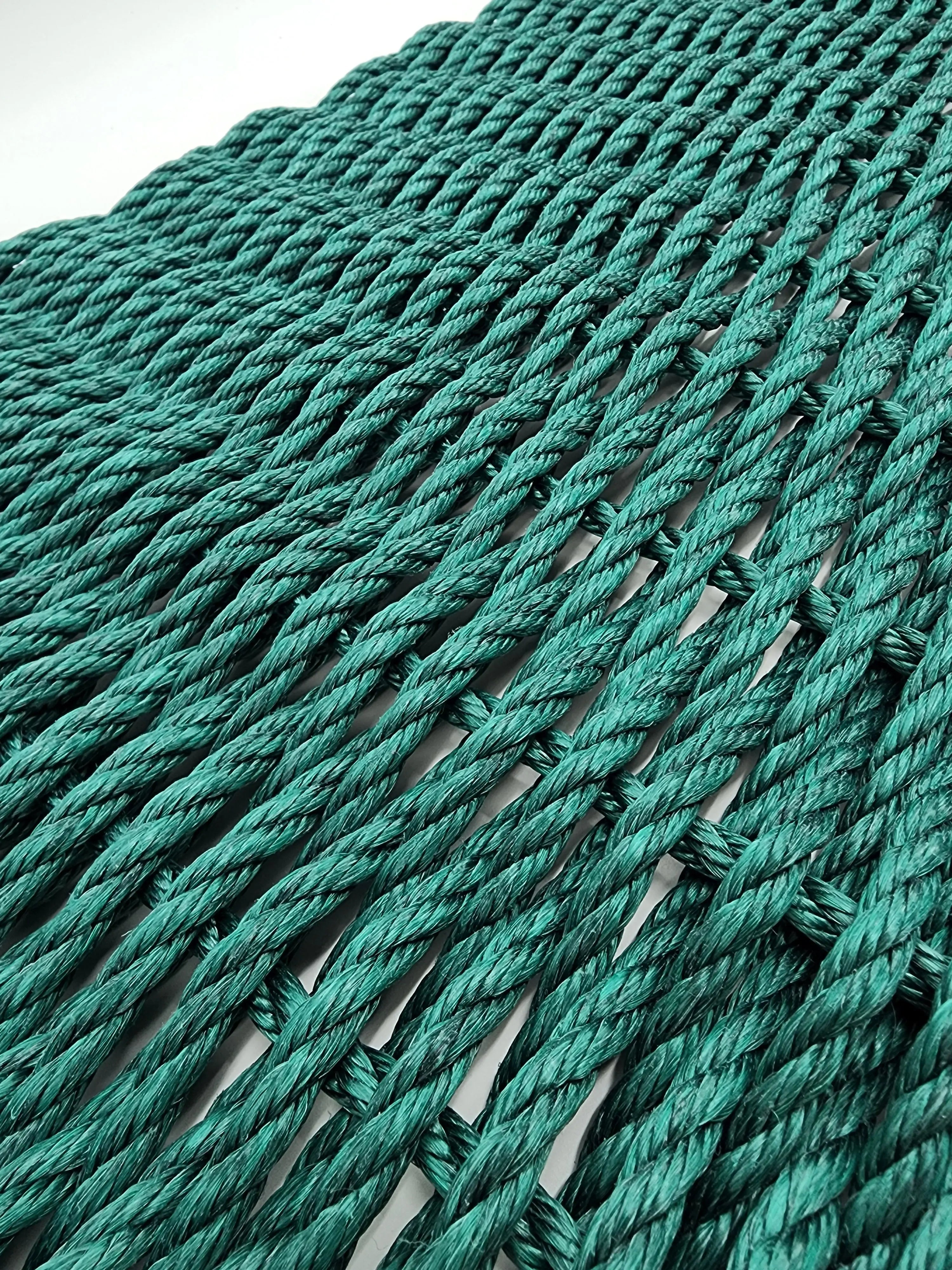 Handmade solid color rope door mat in various colors and sizes