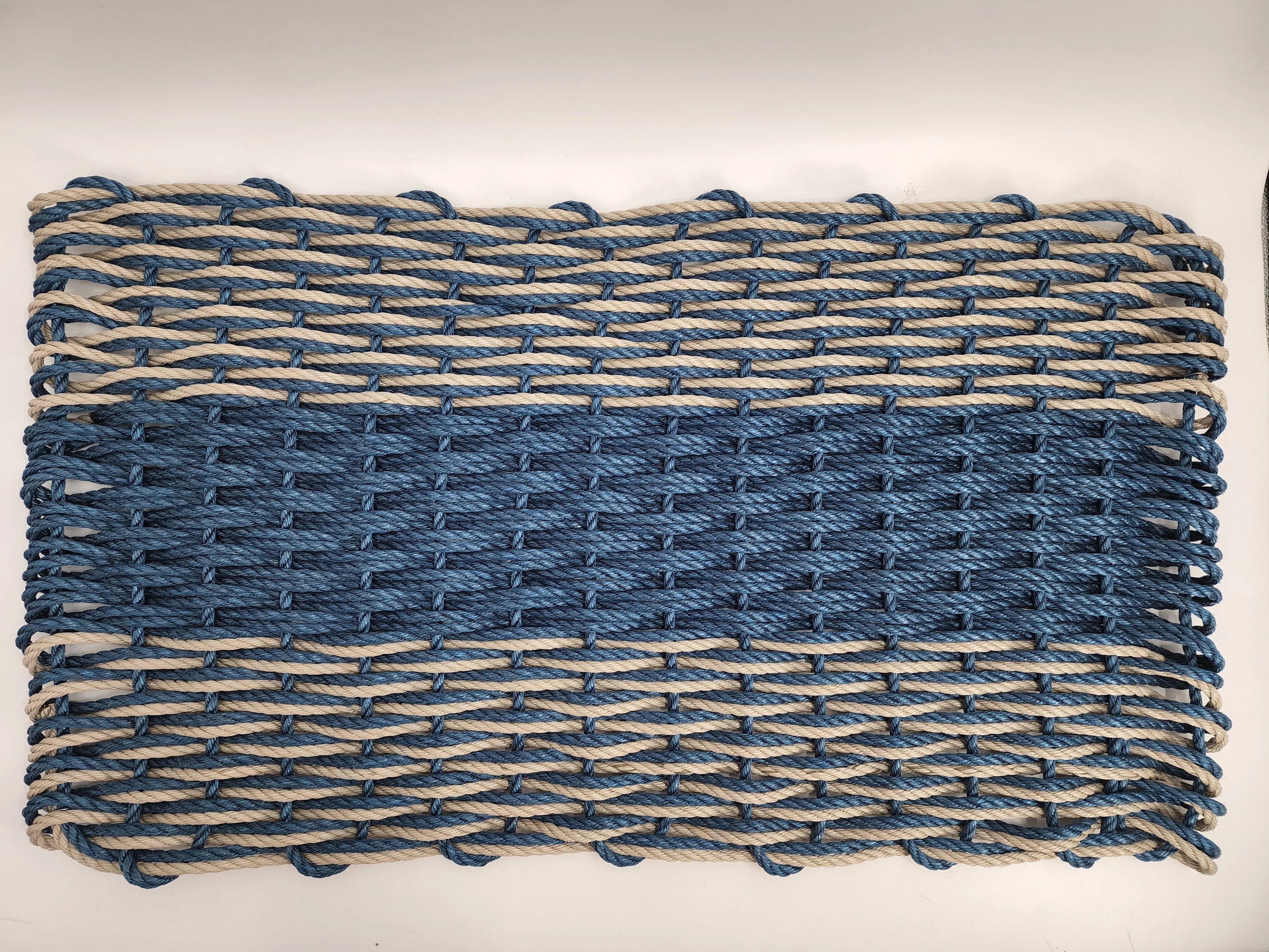 Large navy blue and tan lobster rope mat with double basket weave