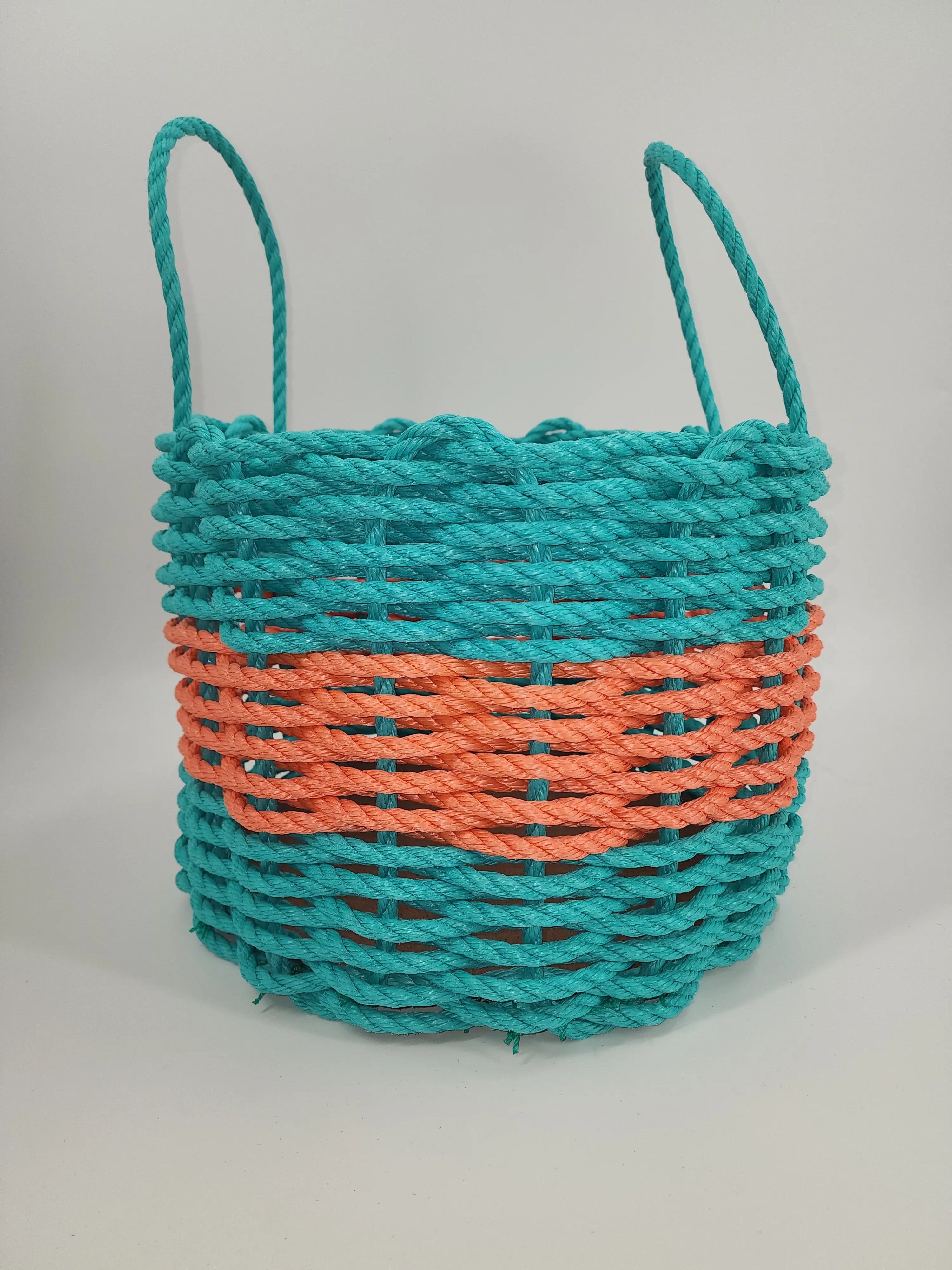 Handmade teal and coral orange lobster rope storage basket with mesh bottom and removable platform