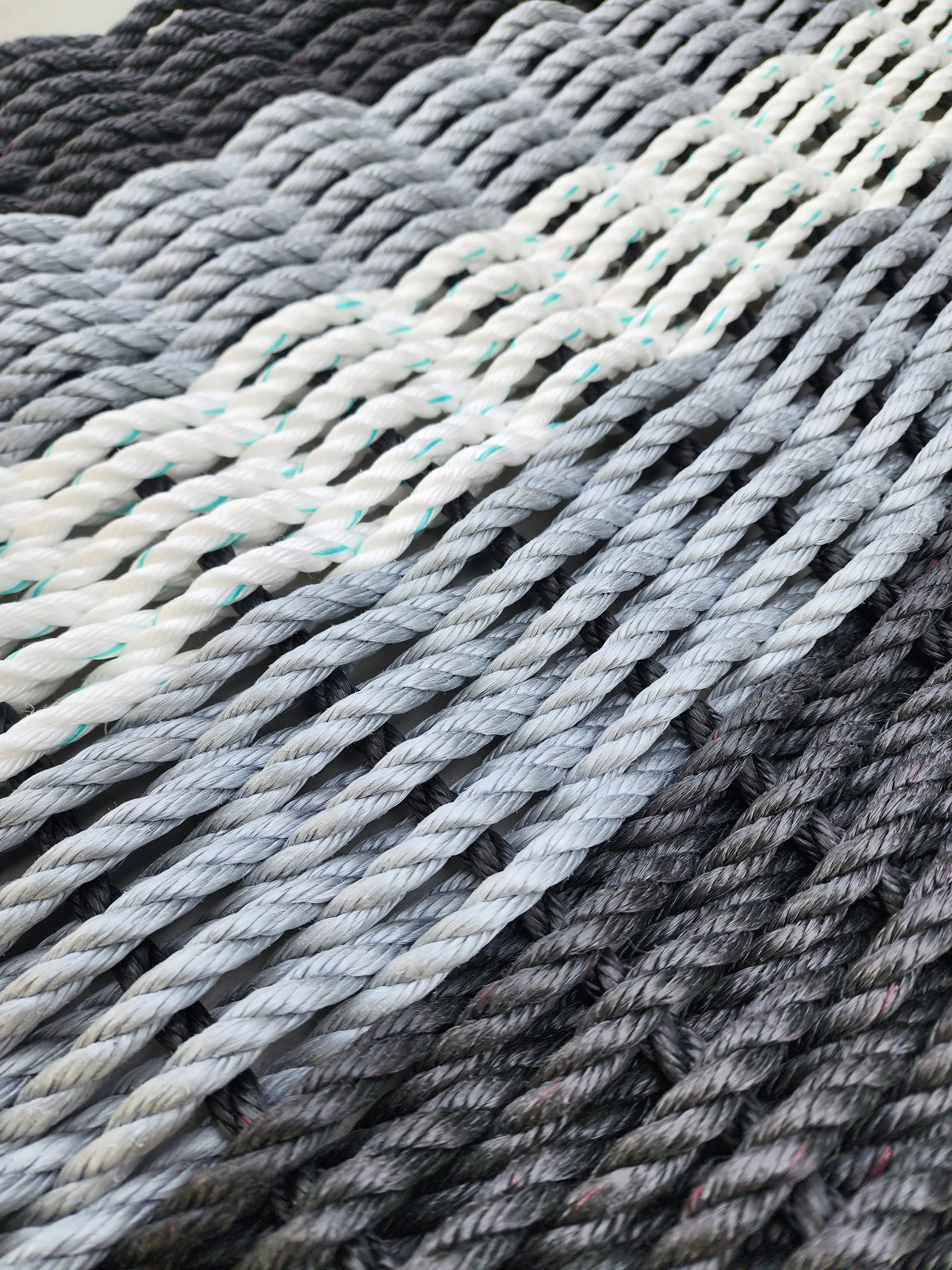 5 Stripe Lobster Rope Mat in black, gray, and white stripes by Little Salty Rope