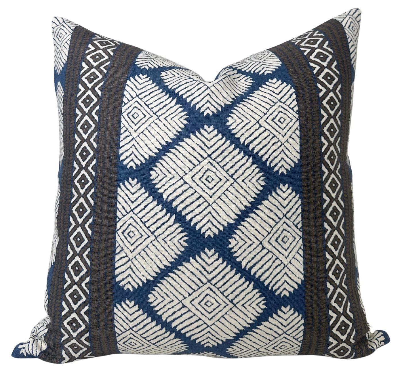 Austin Pillow Cover showing brown and navy printed fabric front and ivory linen back with fine stitching and hidden zipper