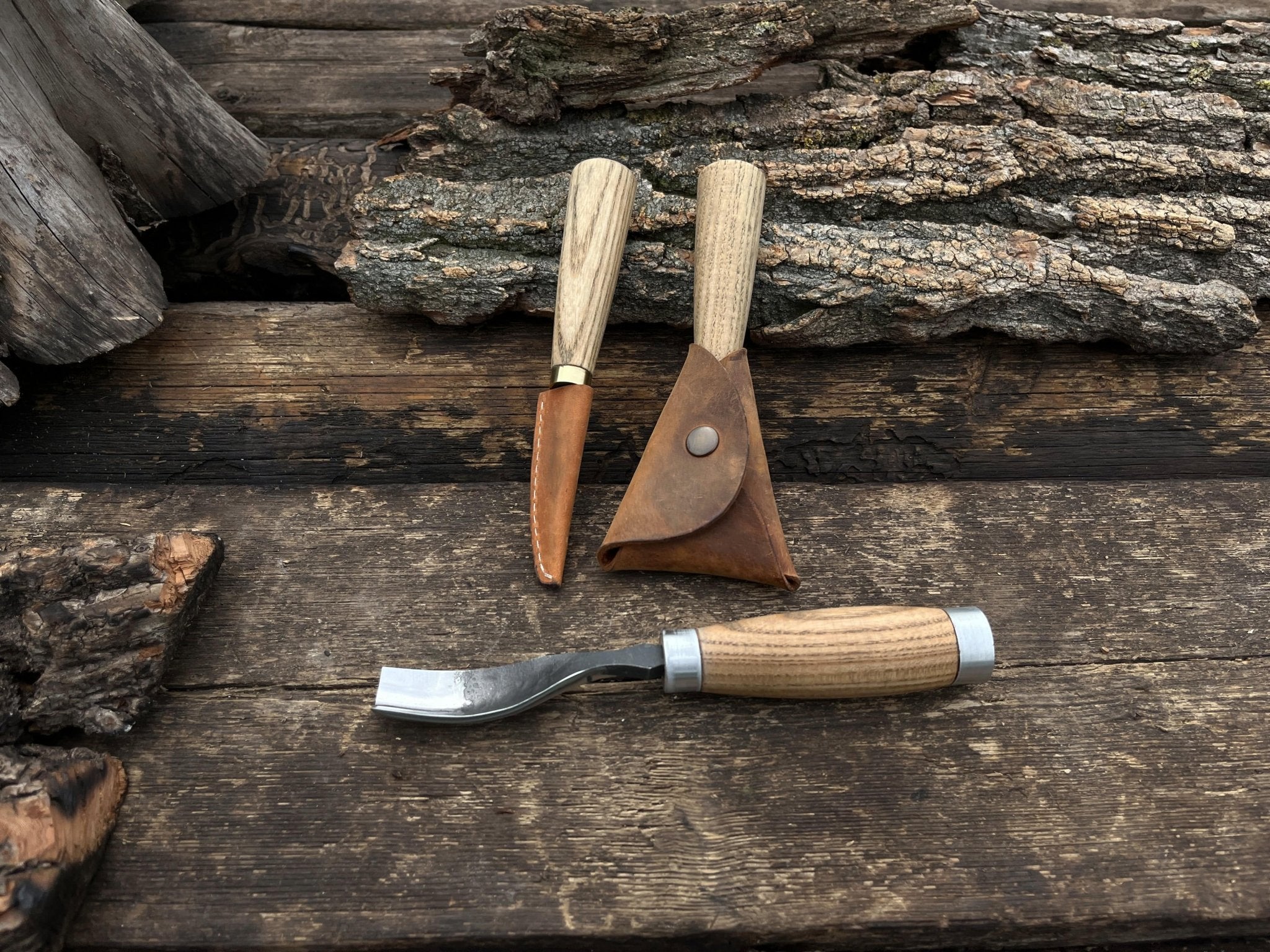 3-piece hand-forged spoon carving tool set with ash handles and leather sheaths