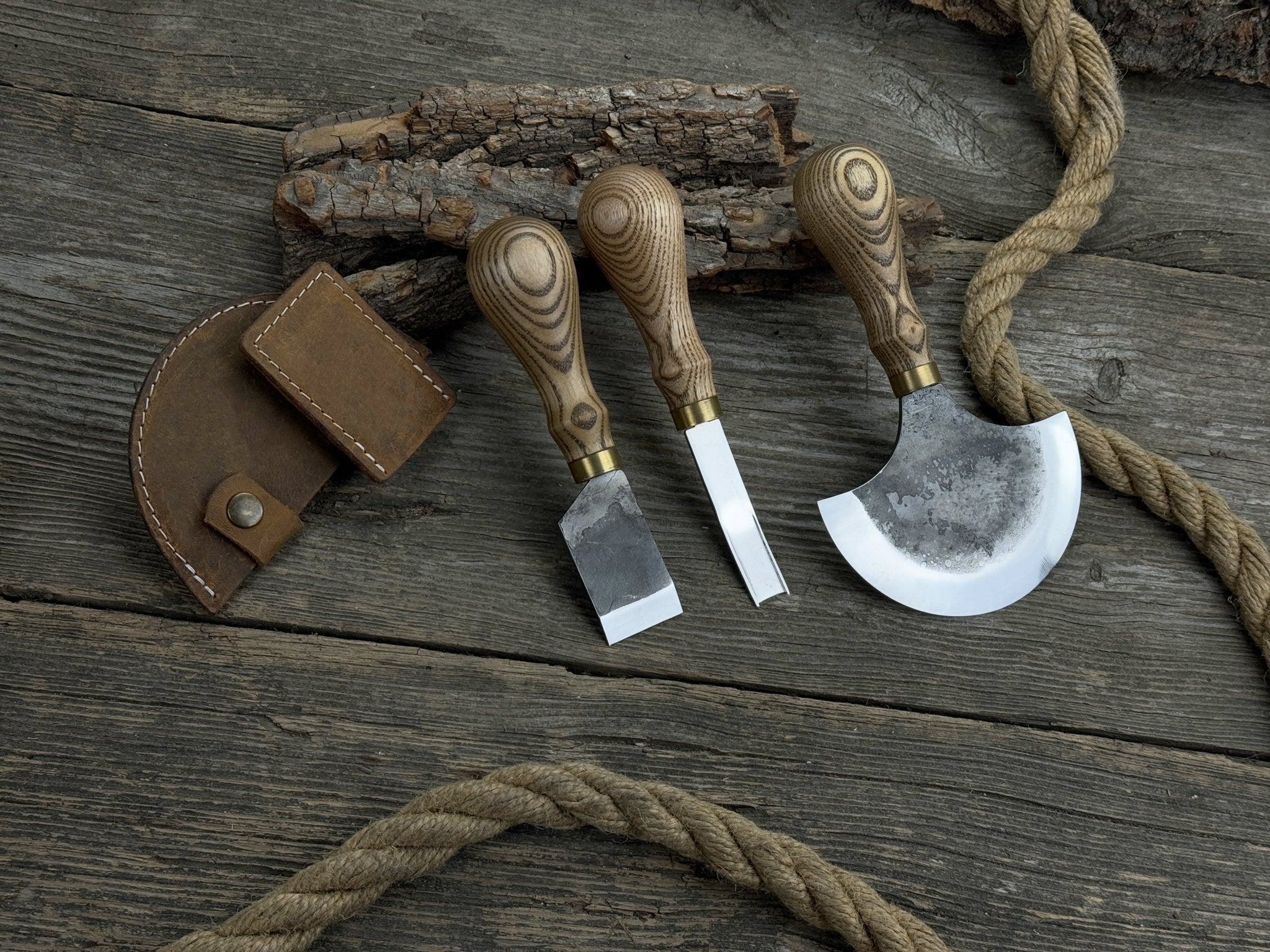 3-piece leather working kit with leather sheaths including half moon knife, flat skiving knife, and edge skiver