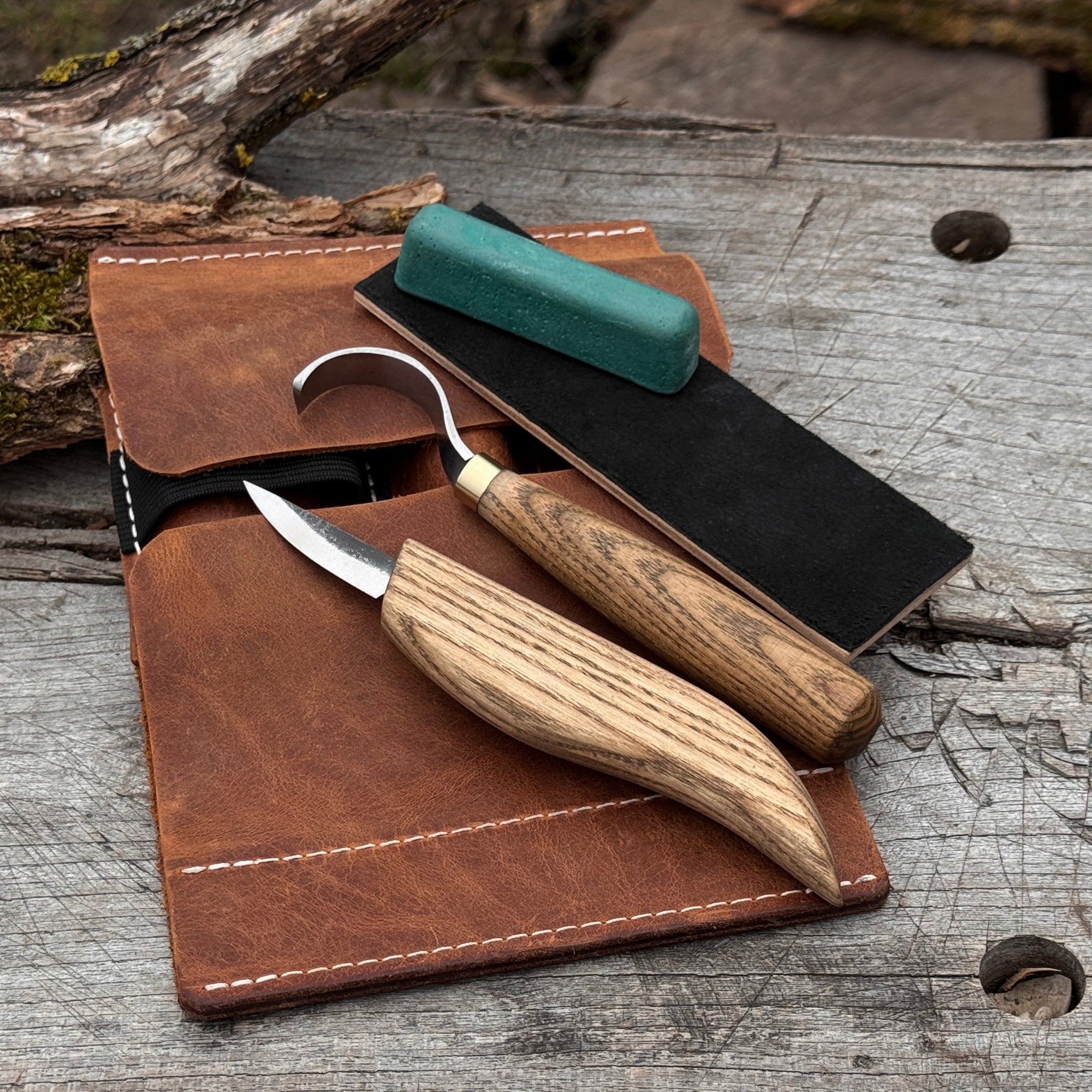 3-piece spoon carving set including whittling knife, hook knife, and leather sharpening strop with ash wood handles