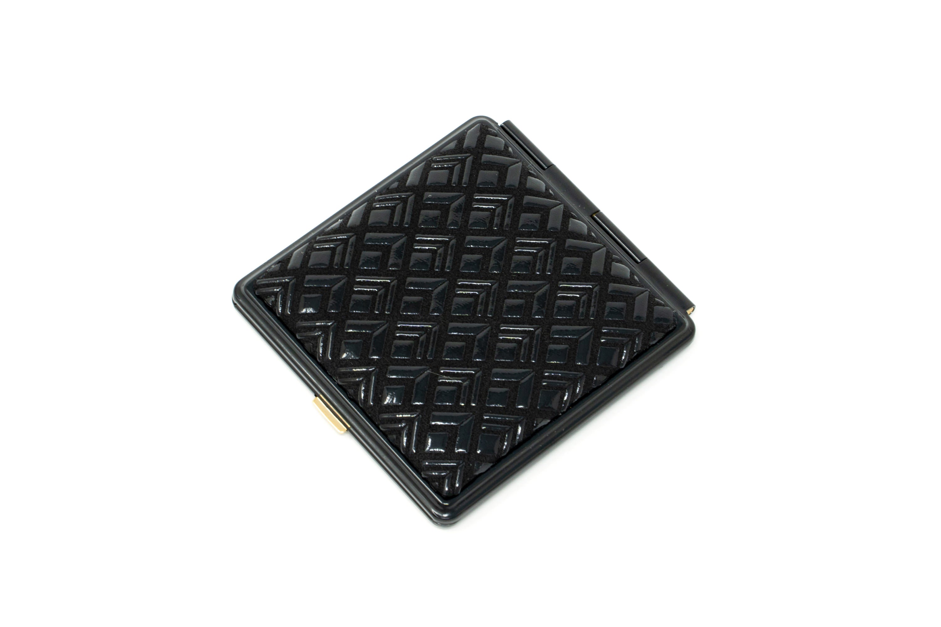 Inden Mirror - Diamond Frame showing exterior diamond pattern of deer skin with natural lacquer finish