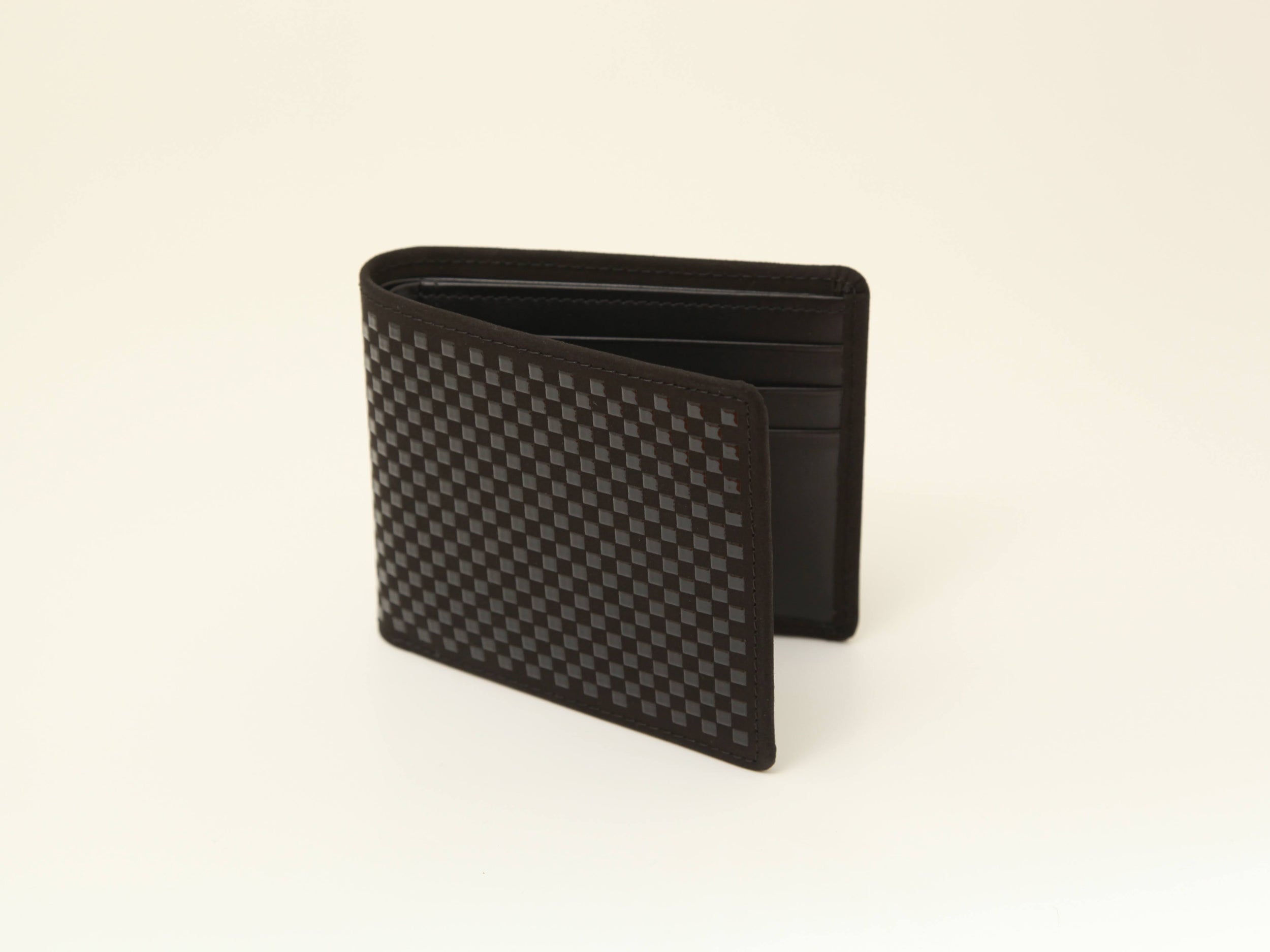 Black x Black INISHIE Folded Wallet I showing folded design and textured leather