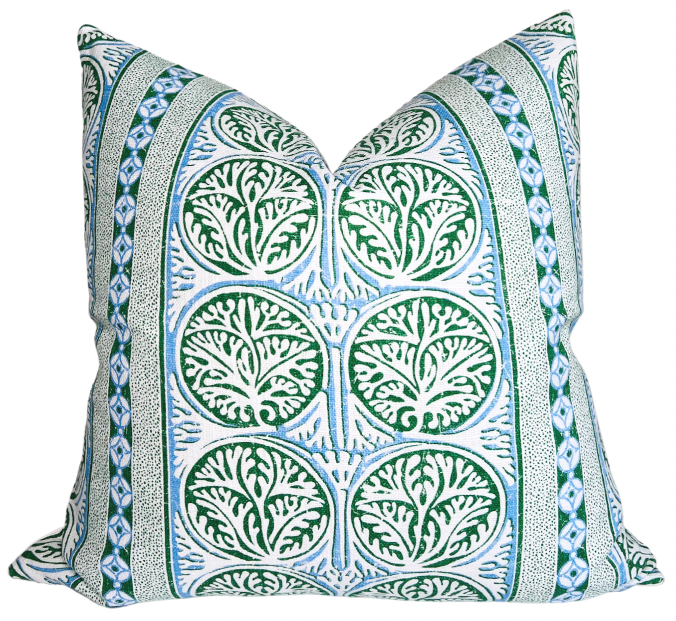 Fair Isle pillow cover in blue and green with ivory linen backing draped on a sofa
