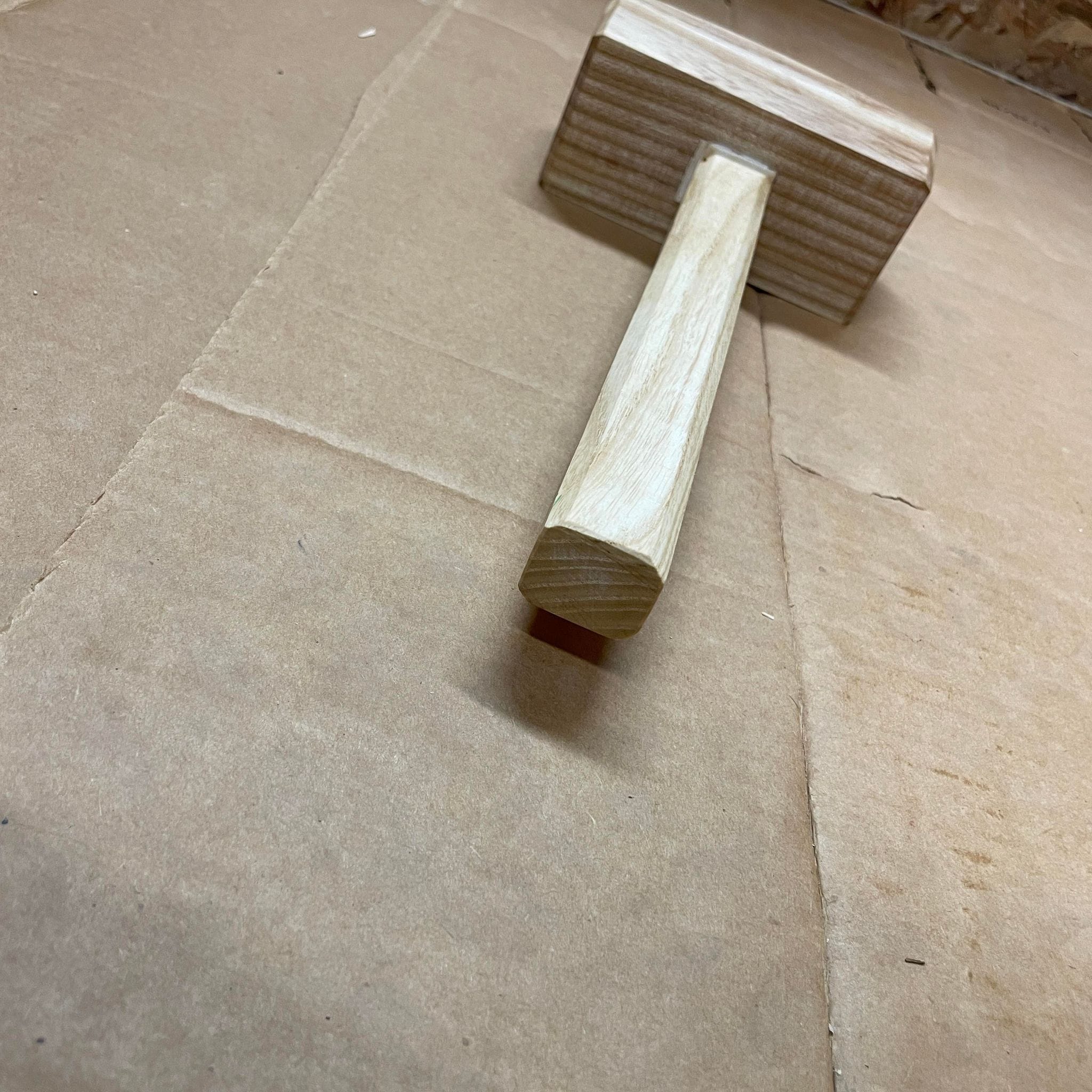 Handmade ash wooden carpenter's mallet with oiled finish