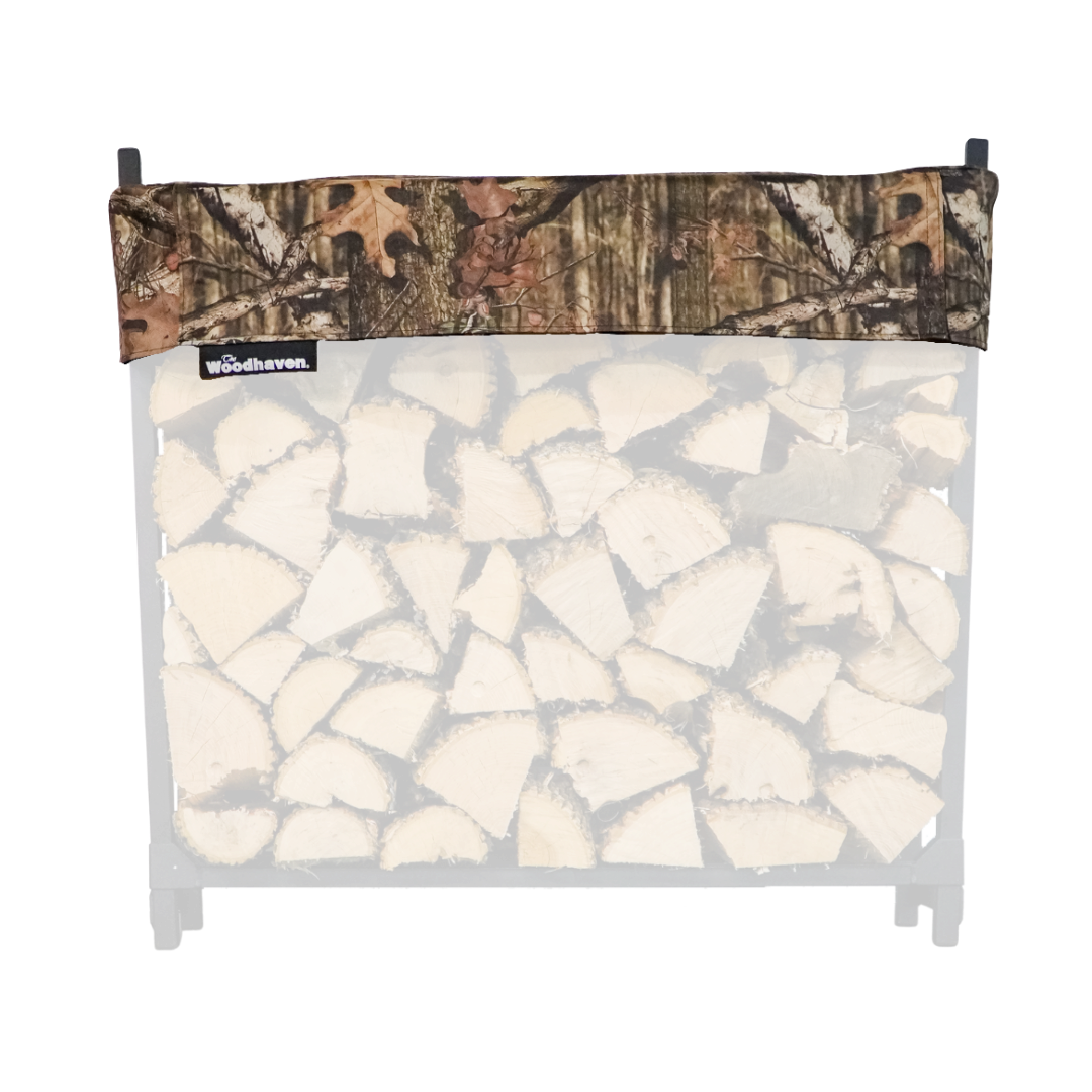 Woodhaven Short Firewood Rack Seasoning Cover in black on a firewood rack