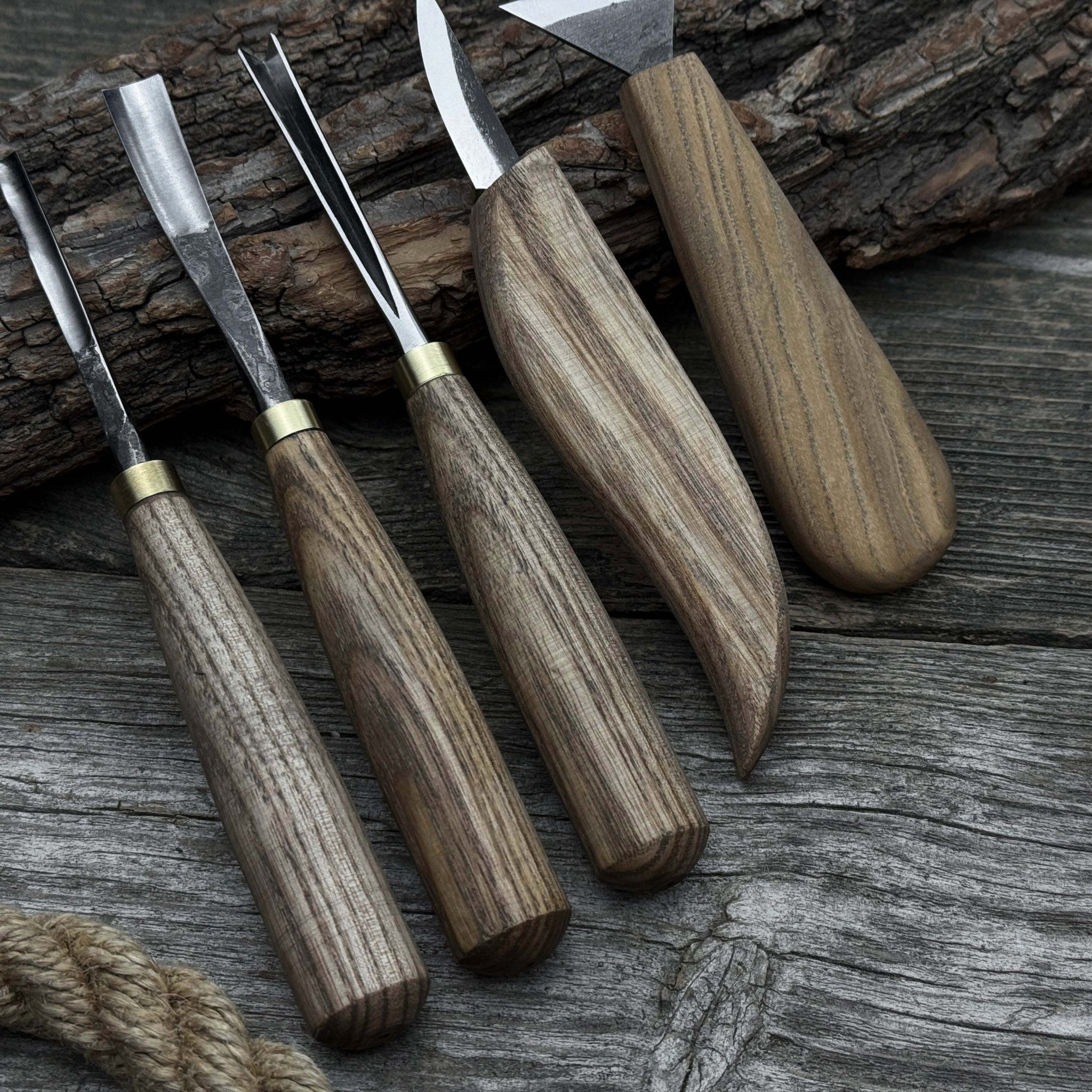 5-piece wood carving tool set including carving knives, chisels, and gouges with wooden handles