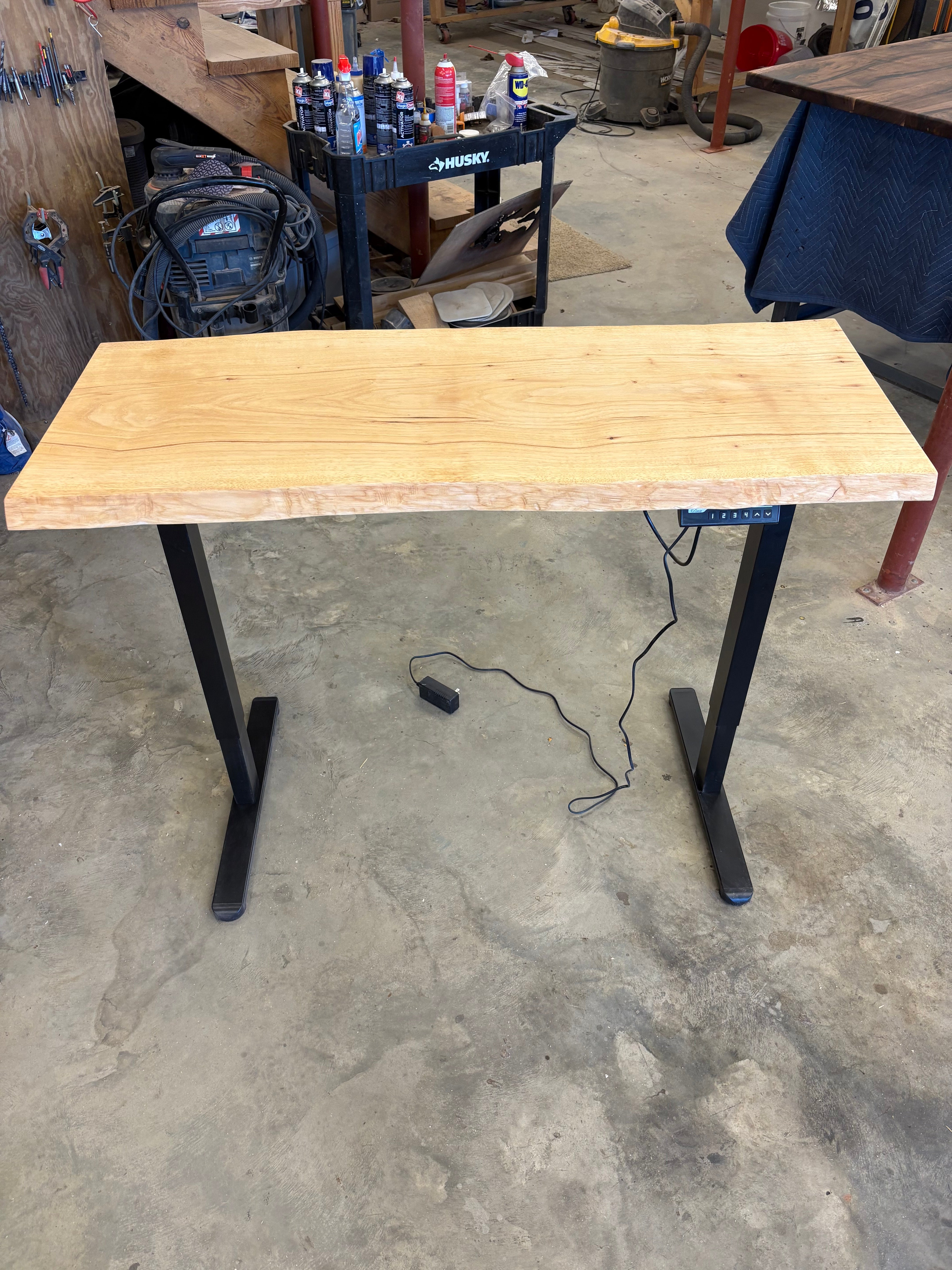 Adjustable height sit/stand pecan desk with wooden finish and metal legs