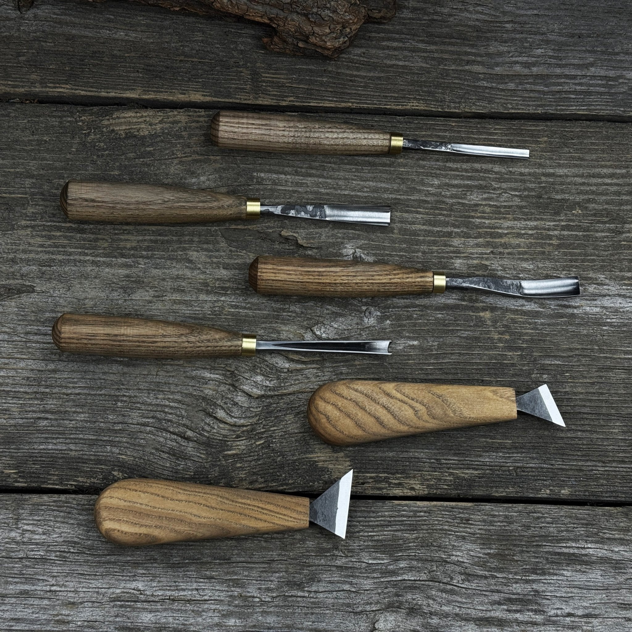 6-piece wood carving tool set including knives, gouges, and chisels with wooden handles