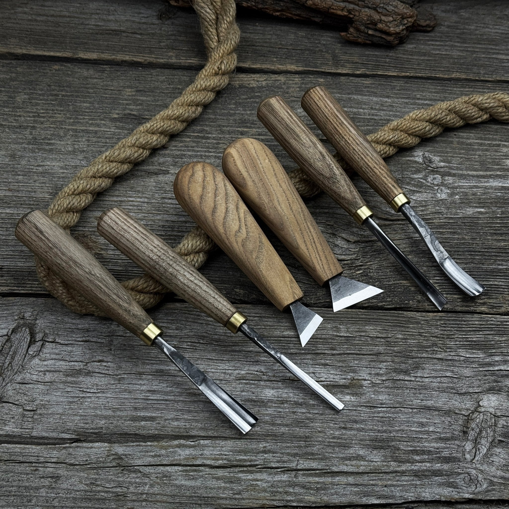 6-piece wood carving tool set including knives, gouges, and chisels with wooden handles