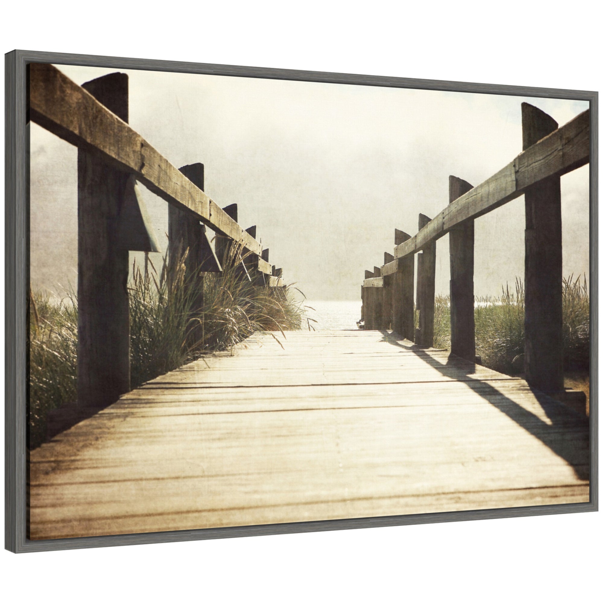 Framed canvas art depicting a wood walkway leading through coastal woods at Cannon Beach
