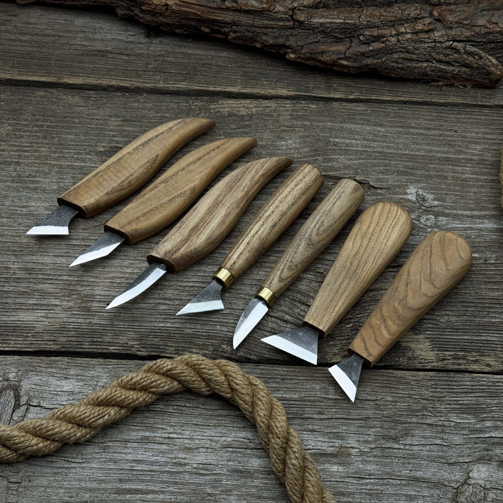 7-Piece Wood Carving Knife Set with hand-forged blades and ash wood handles