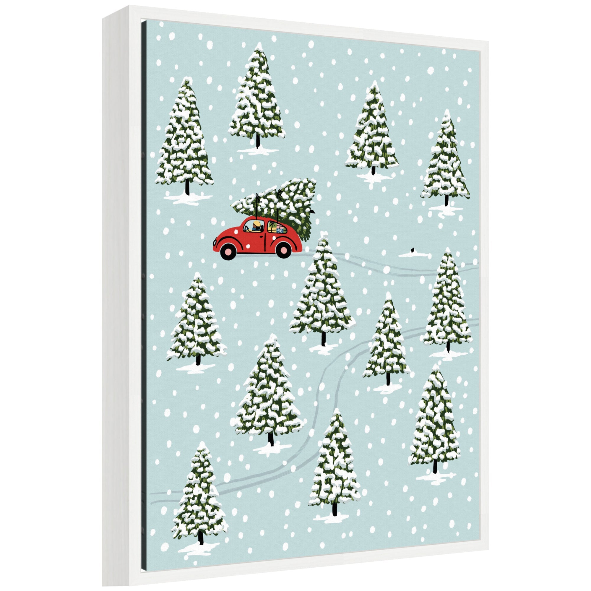Sylvie Framed Canvas depicting a red car carrying a Christmas tree through a snowy forest with tall snow-covered trees and gentle snowfall.