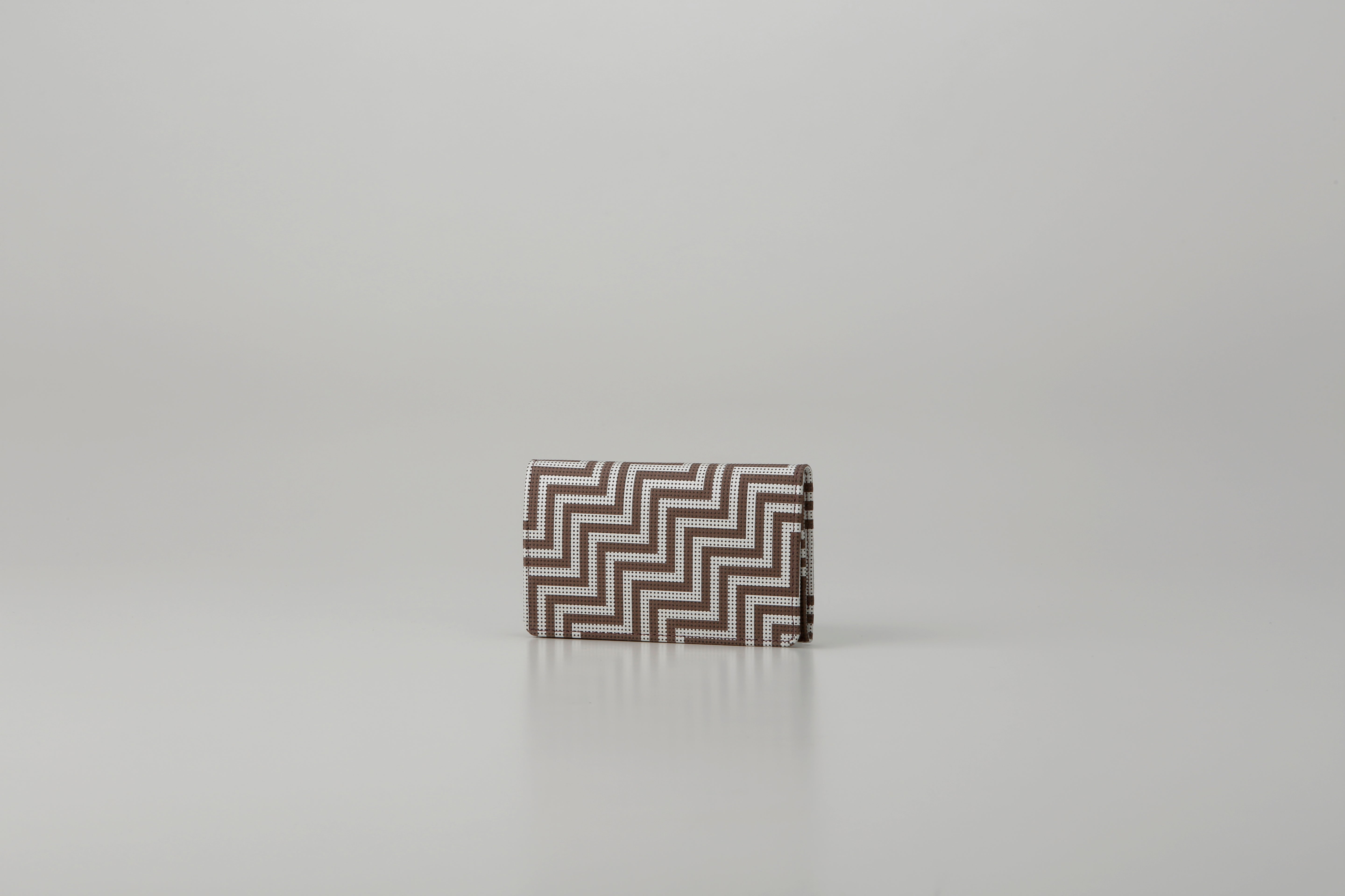 Business Card Case - New Grecian by Inden showing greige deer leather with white hand-drawn pattern and gray lacquer dots