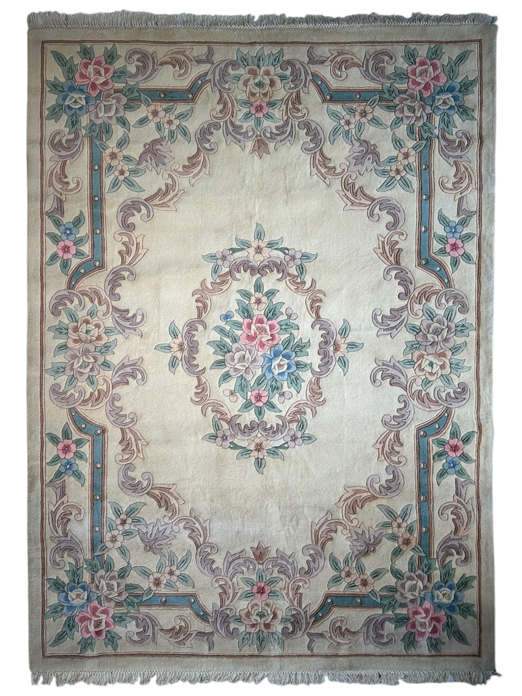 Hand-tufted Chinese Aubusson wool rug with traditional floral motifs in warm earth tones