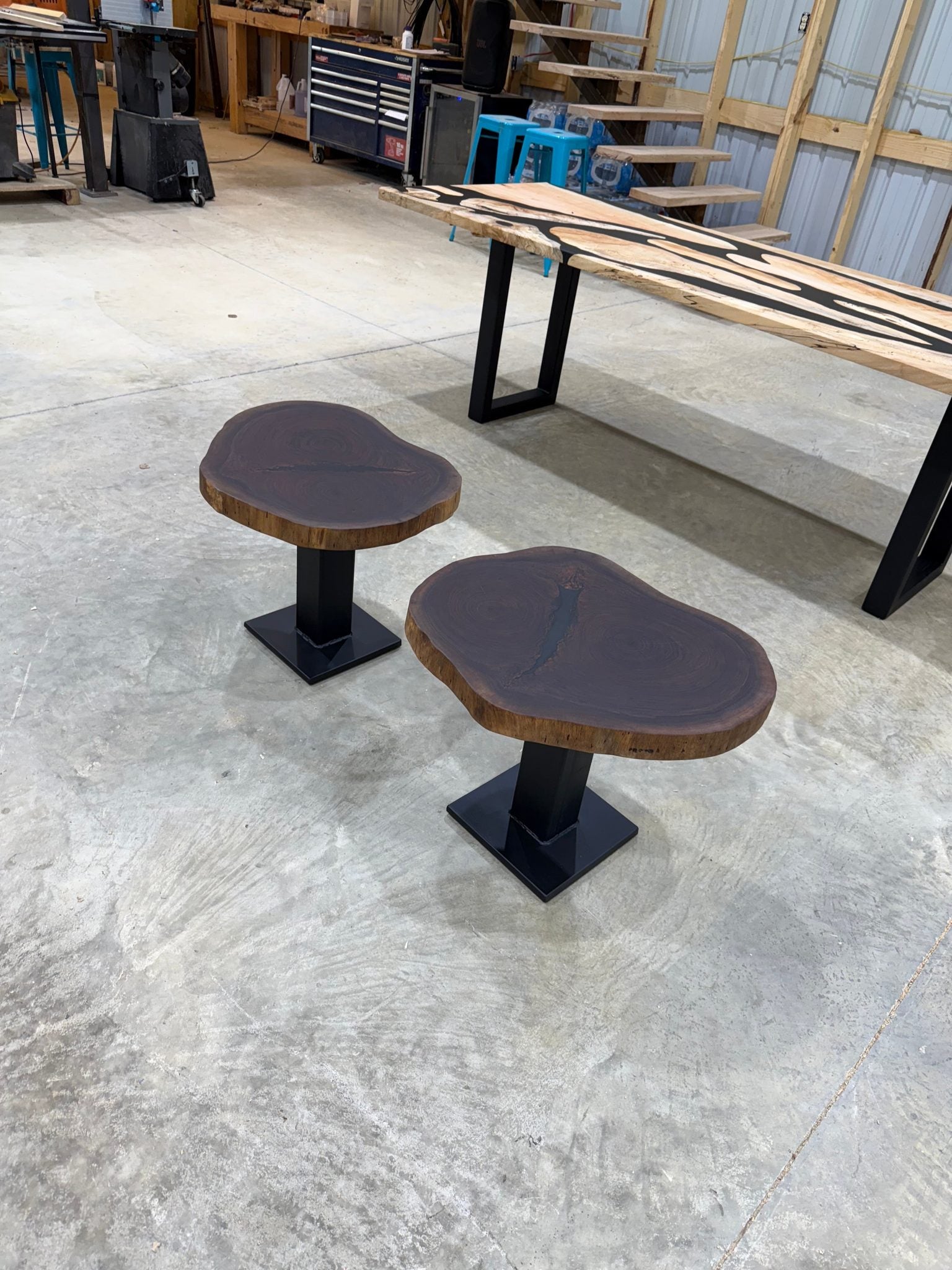 Walnut Cookie Side Tables with thick steel bases, handcrafted by Sasquatch Tables LLC