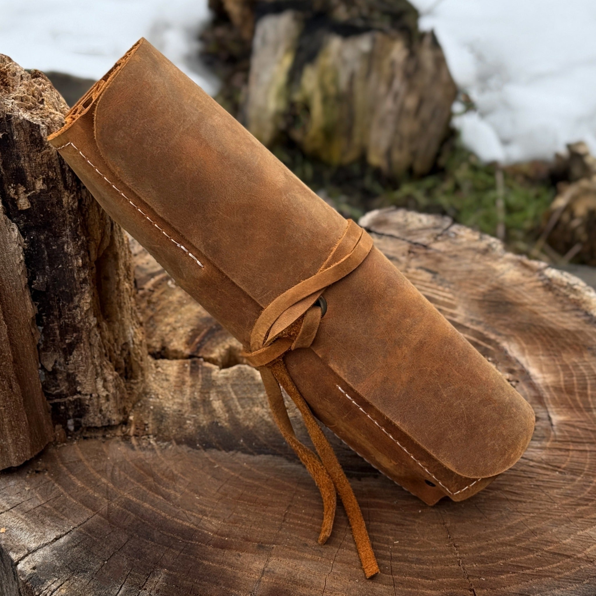 Handmade 8 pocket leather tool roll by Sharky Forged Steel Tools, open with tools inside