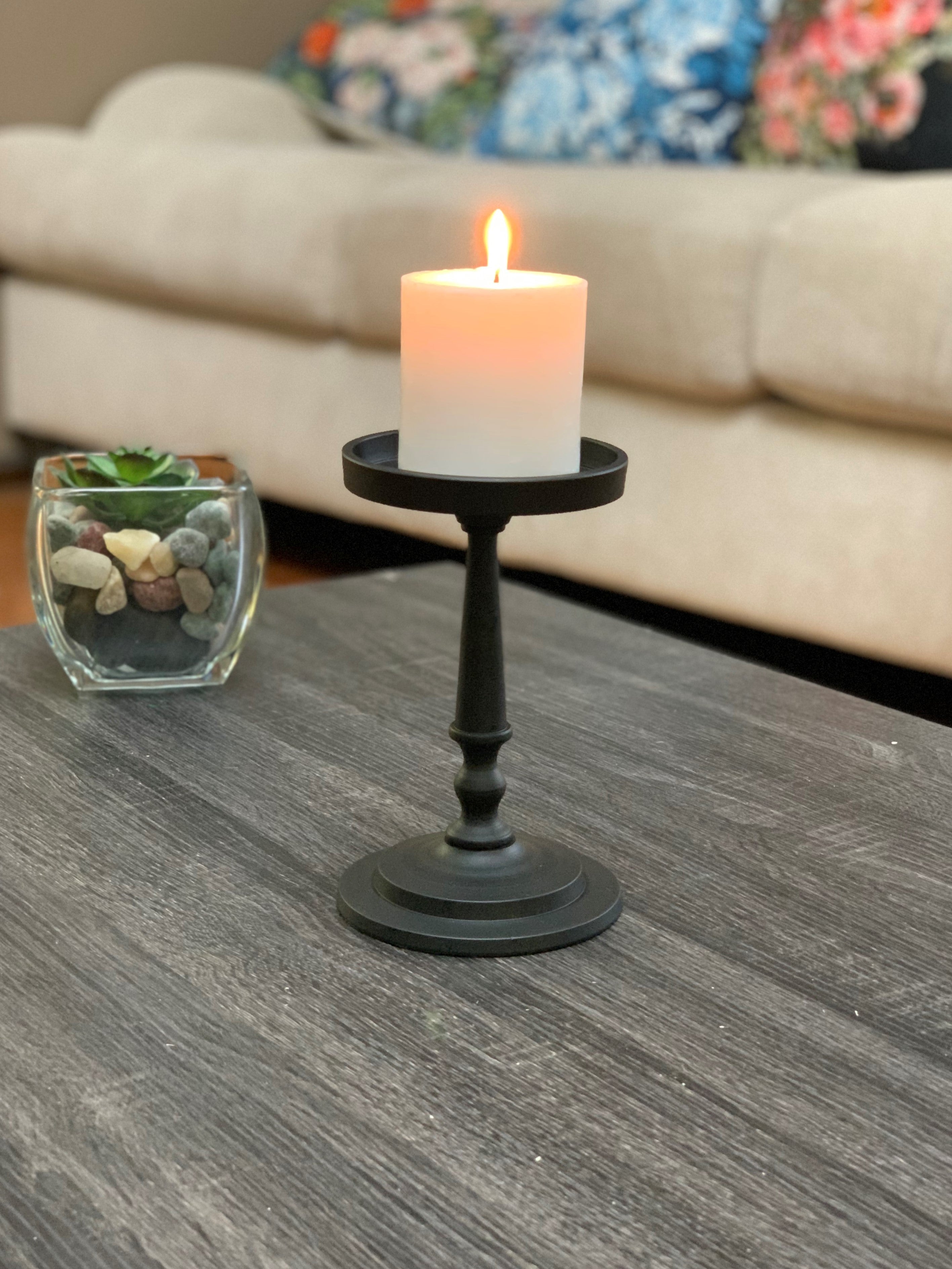 Matte black Vibhsa pillar candle holder on a neutral surface