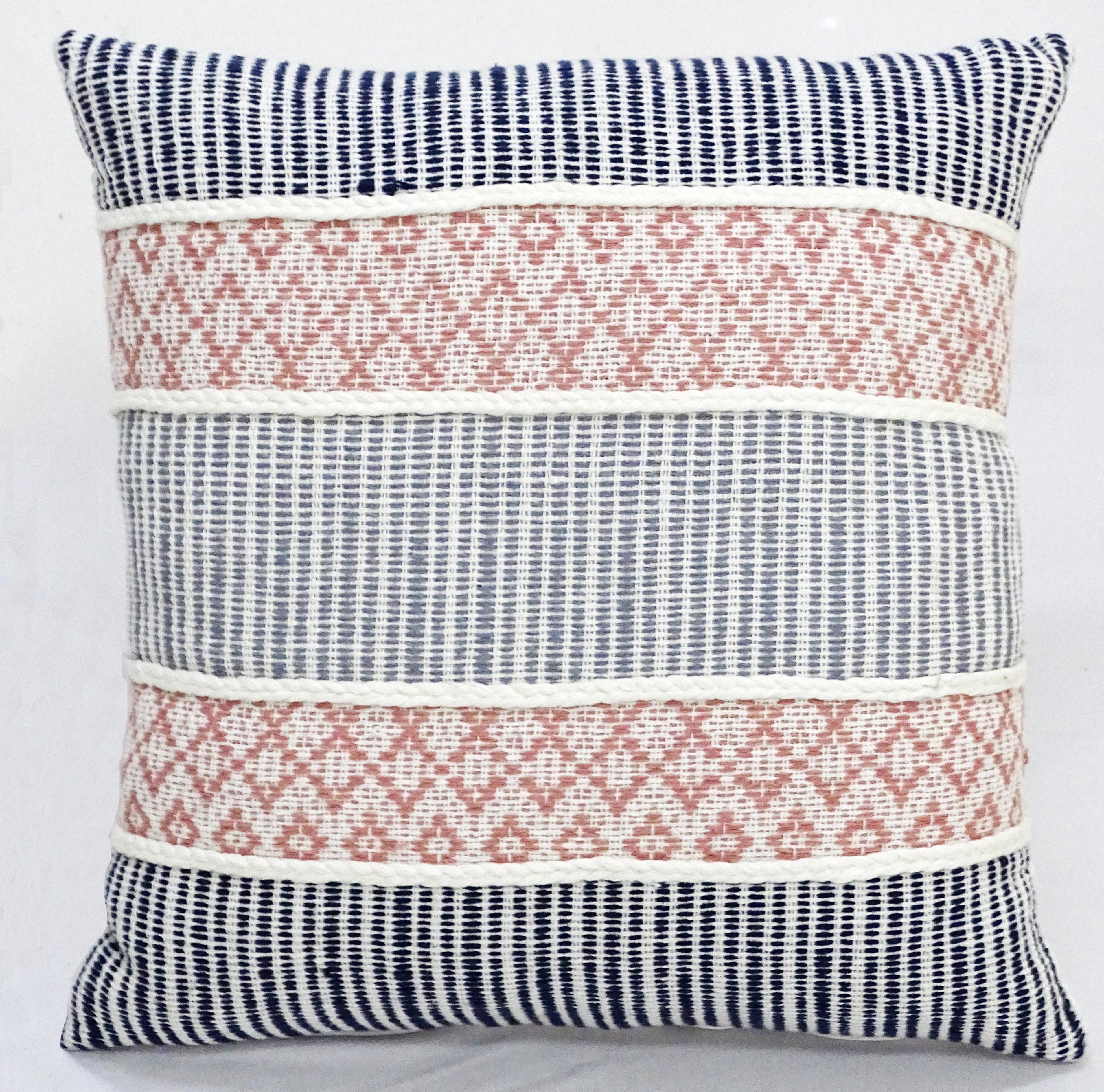 22" X 22" Decorative Throw Pillow featuring black vertical stripes with braided detailing and tassels on a couch
