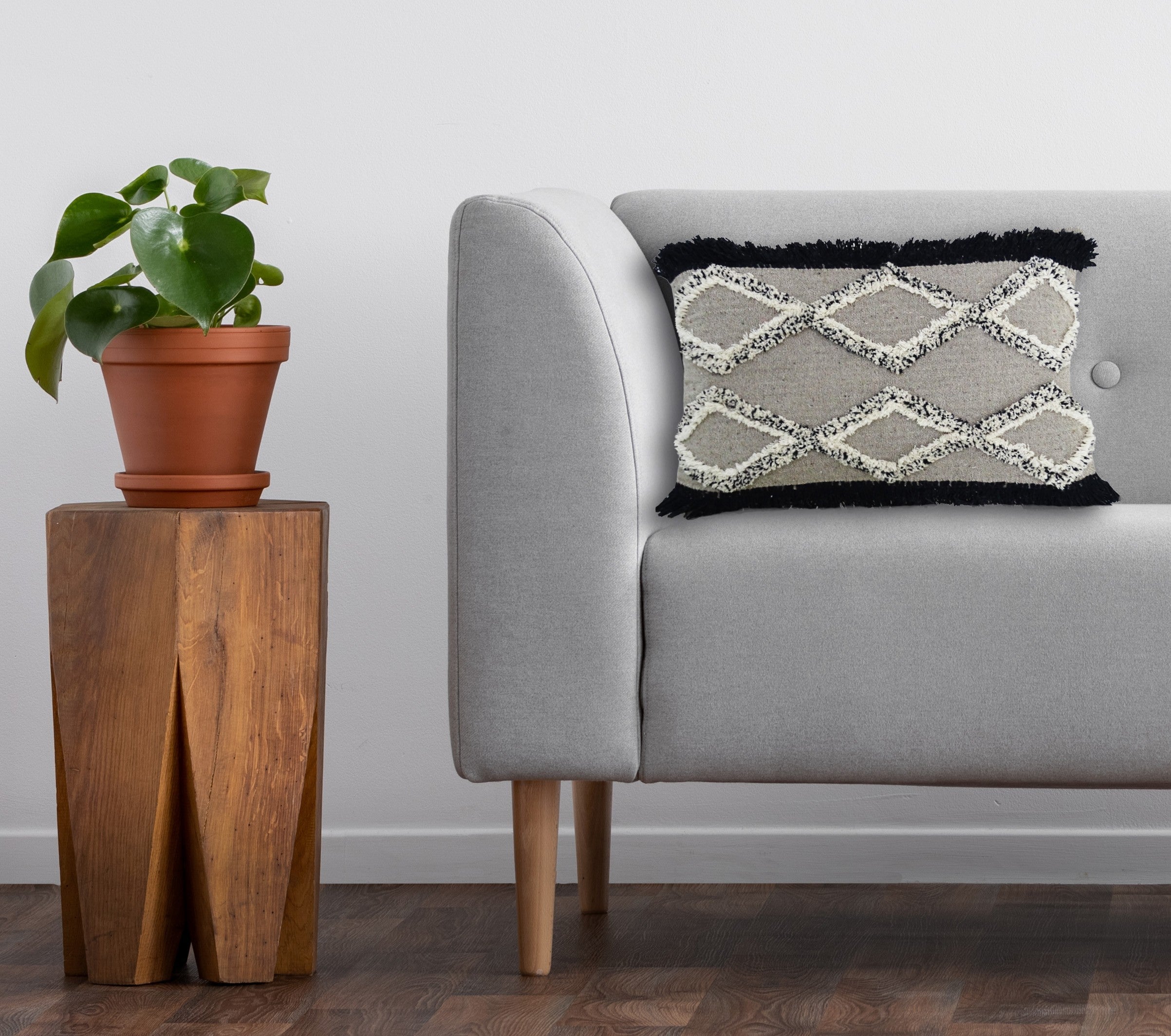 Tufted Decorative Pillow for Living Room 16x22 showing fringed handloom woven front and tassels on corners