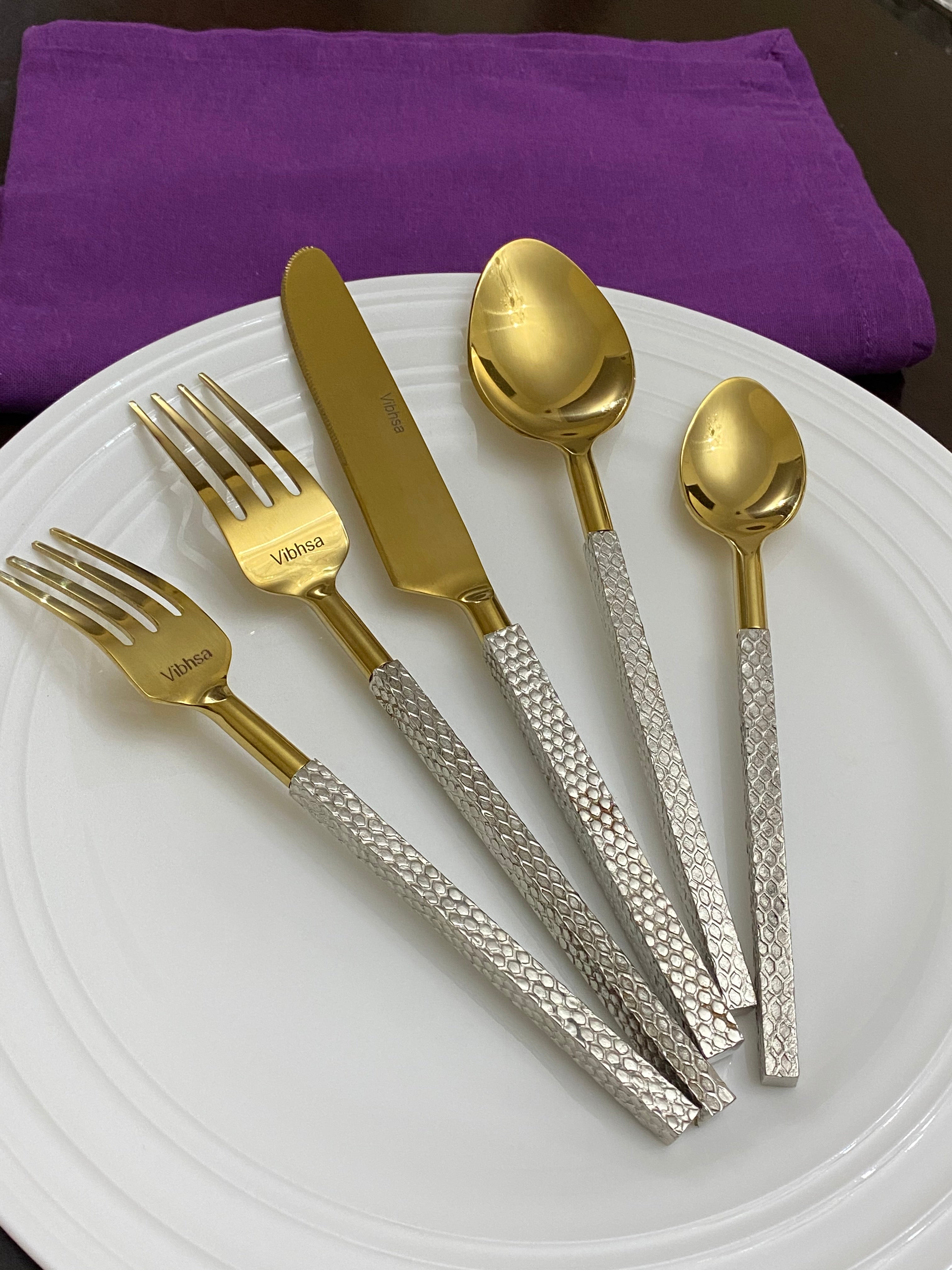 Designer Golden Stainless Steel Flatware Set arranged on a table