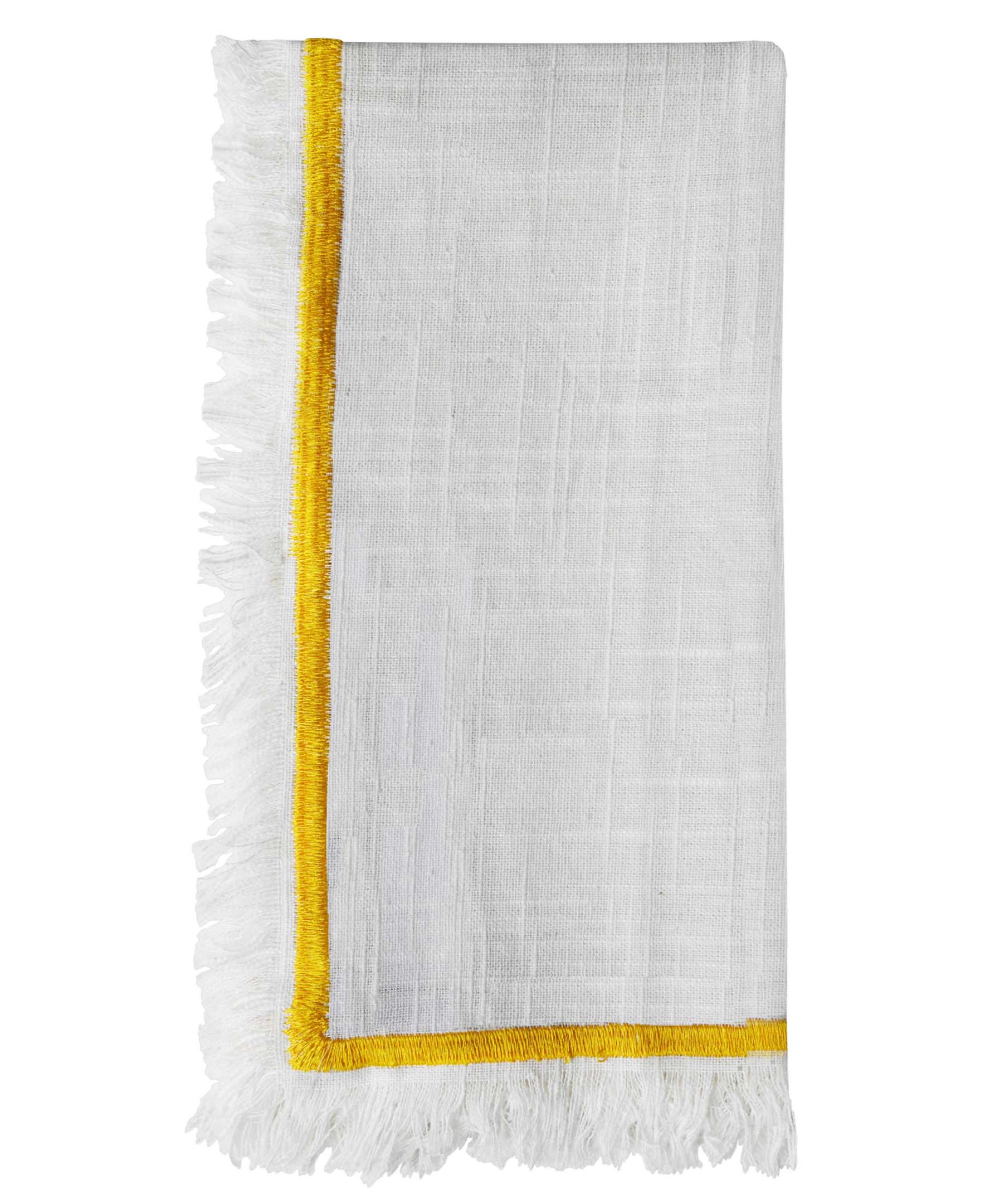 Set of 4 cotton cloth napkins with yellow embroidery arranged on a wooden table