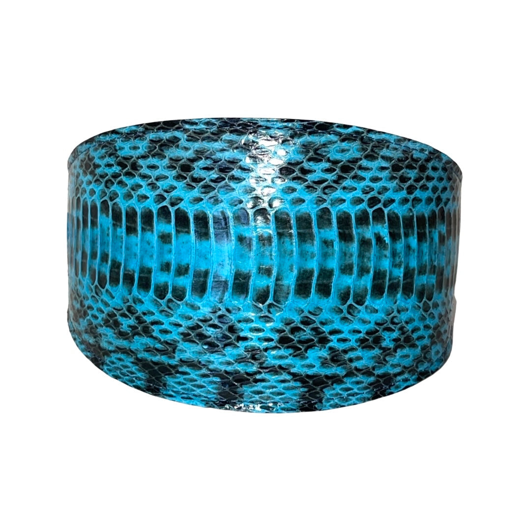 Turquoise and black wide snake collar by Allysa Payne Beverly Hills displayed on a white bust stand