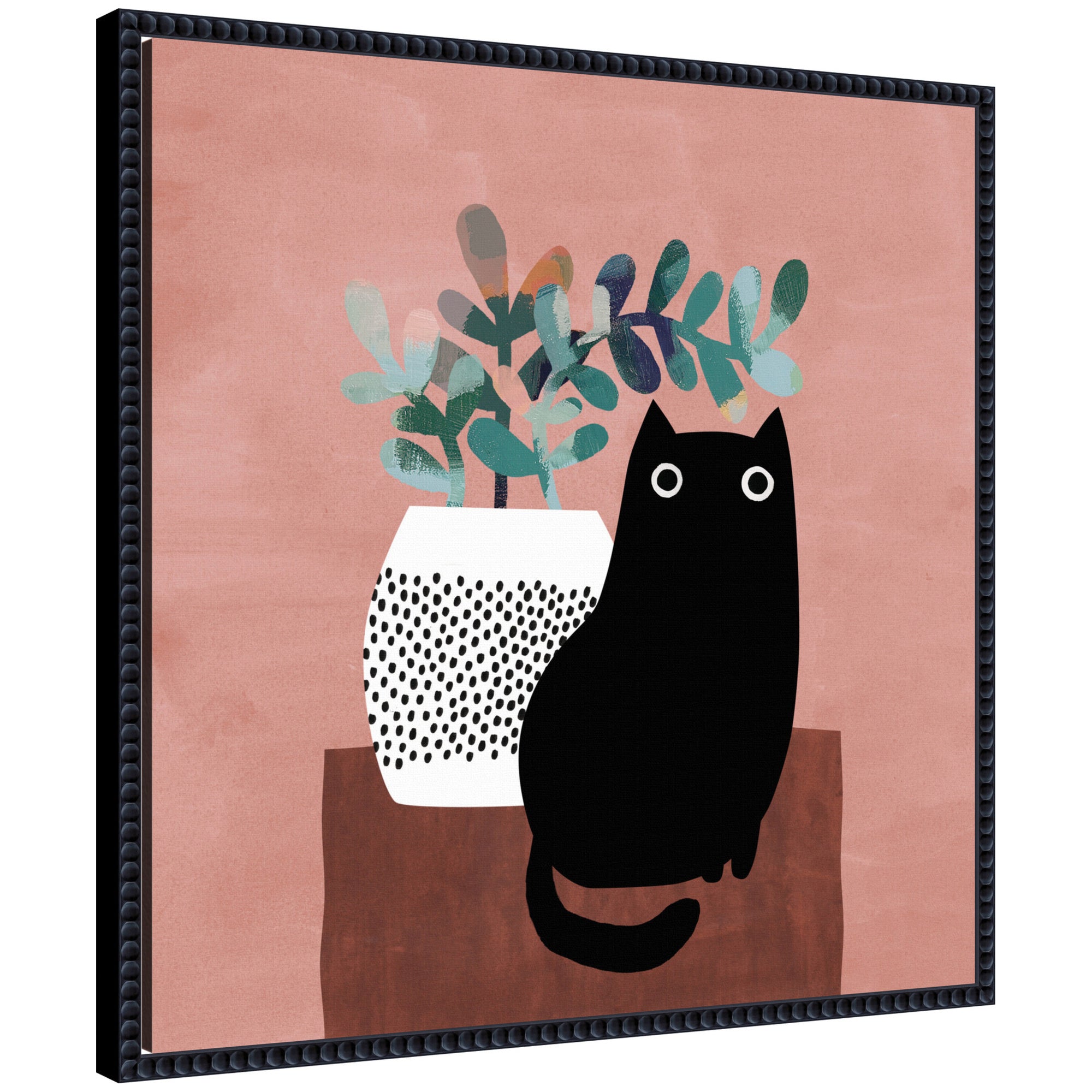 Framed canvas wall art print showing minimalist black cat sitting beside a white vase with abstract green leaves on a pink background
