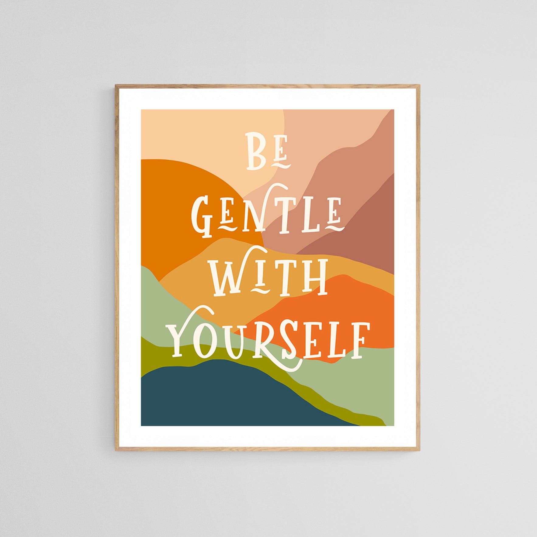 Framed "Be Gentle With Yourself" typography art print in a warm room setting
