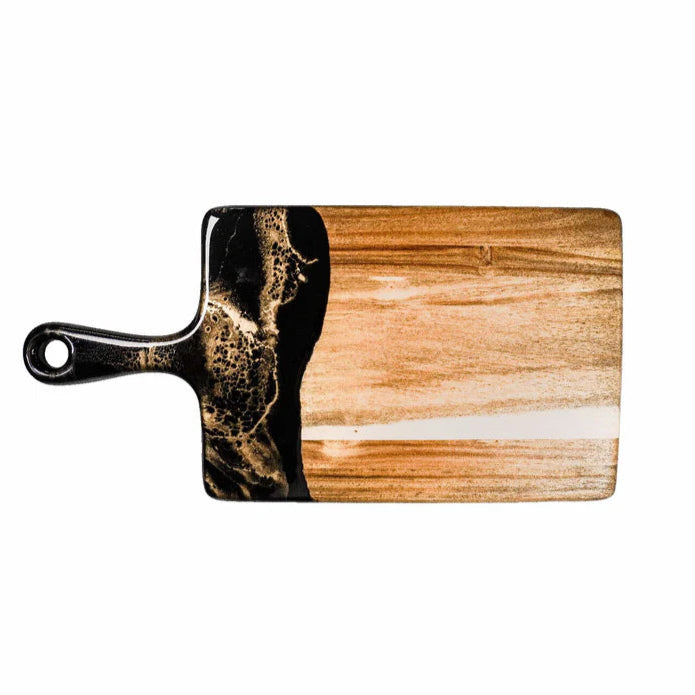 Wooden resin charcuterie board with black handle on a white background