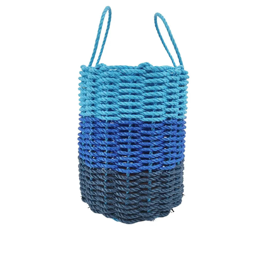 Handwoven storage basket made from navy blue, blue, and light blue Maine lobster rope