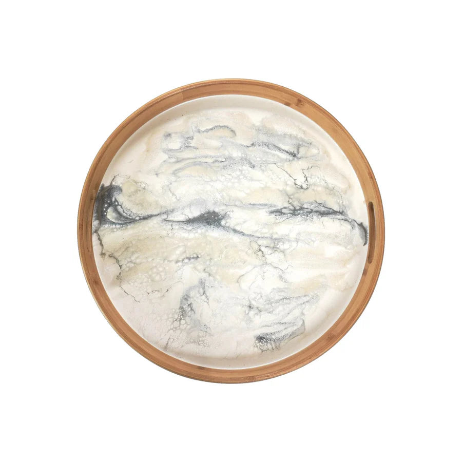 Round resin serving tray with wooden rim on a white background