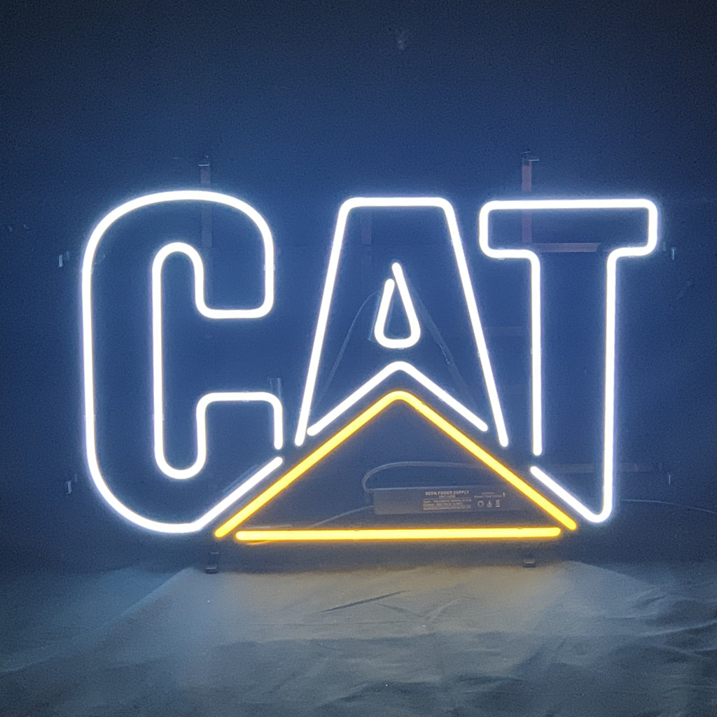 Caterpilla Cat Neon Sign glowing pink on metal grid backing