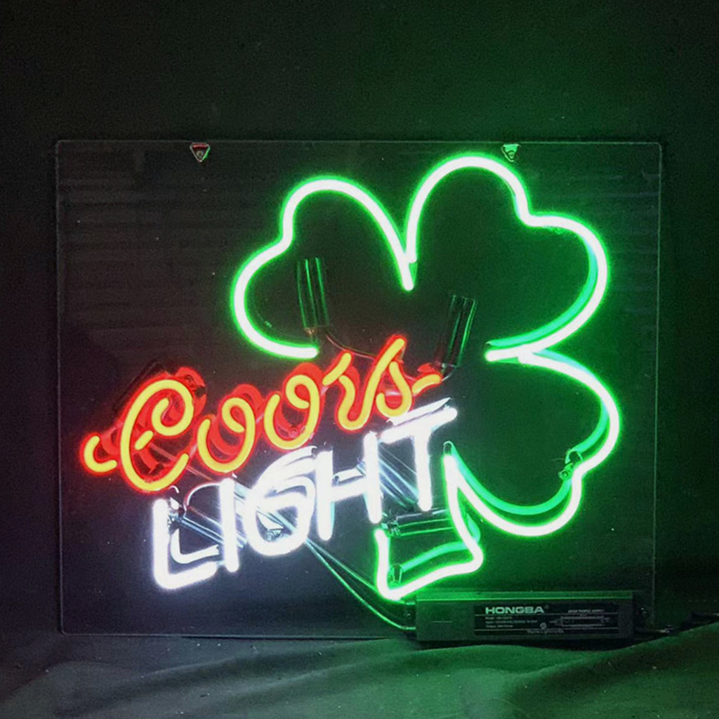 Coors Light Clover Neon Sign Light glowing with cobalt blue and red accents on clear acrylic backing