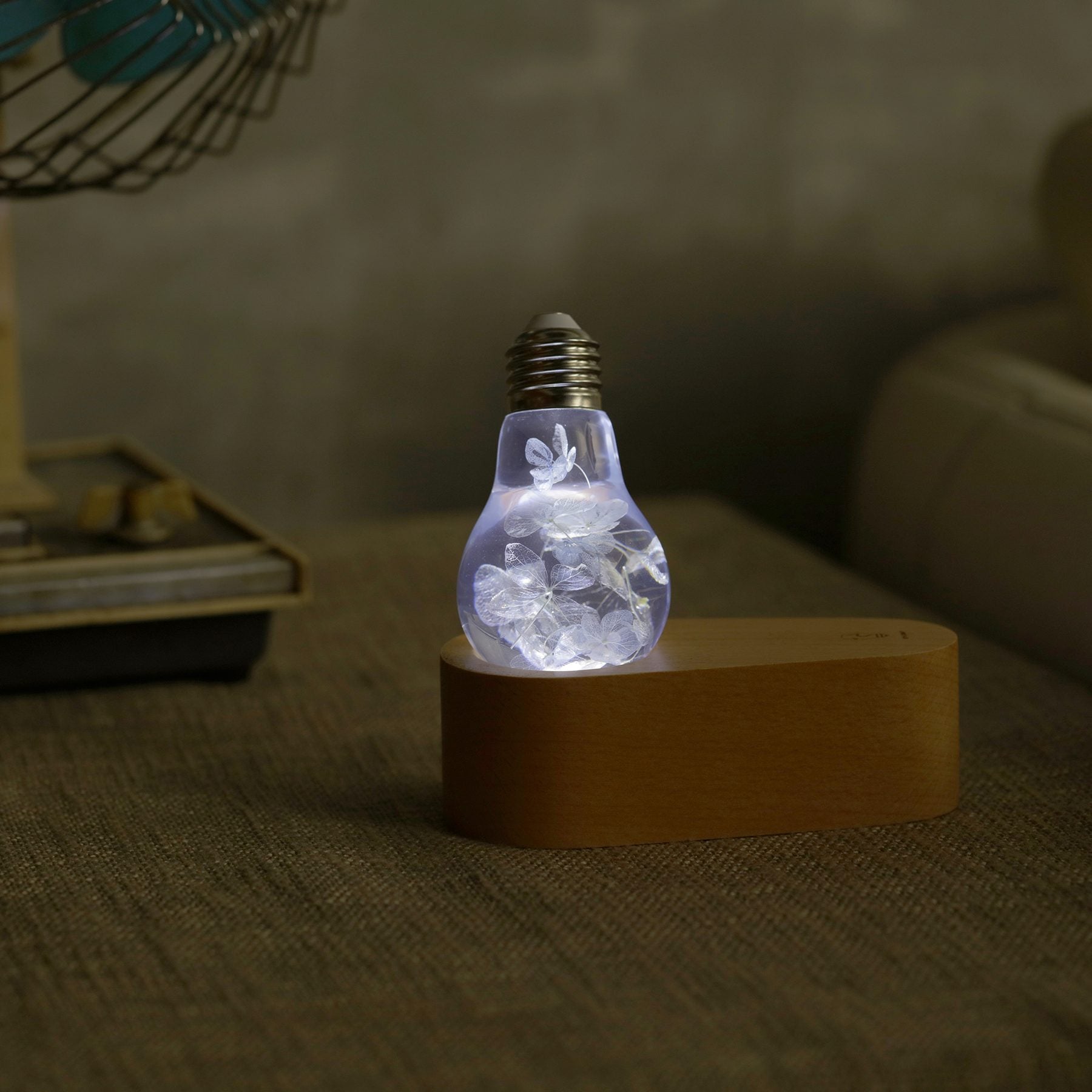 Handcrafted blue hydrangea resin LED bulb with wooden base
