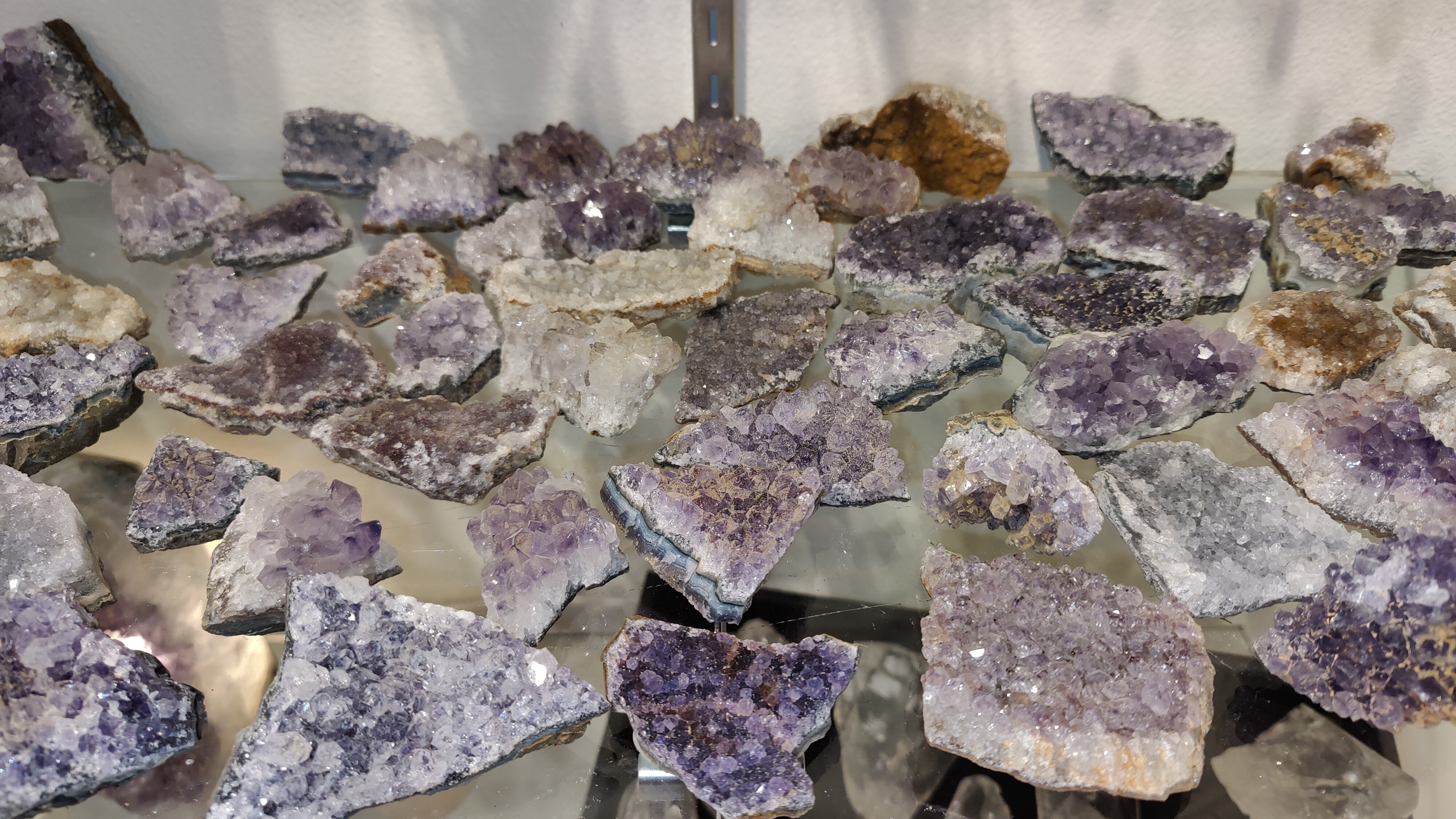 Small Brazilian Amethyst Druze cluster with vibrant purple crystals on natural matrix