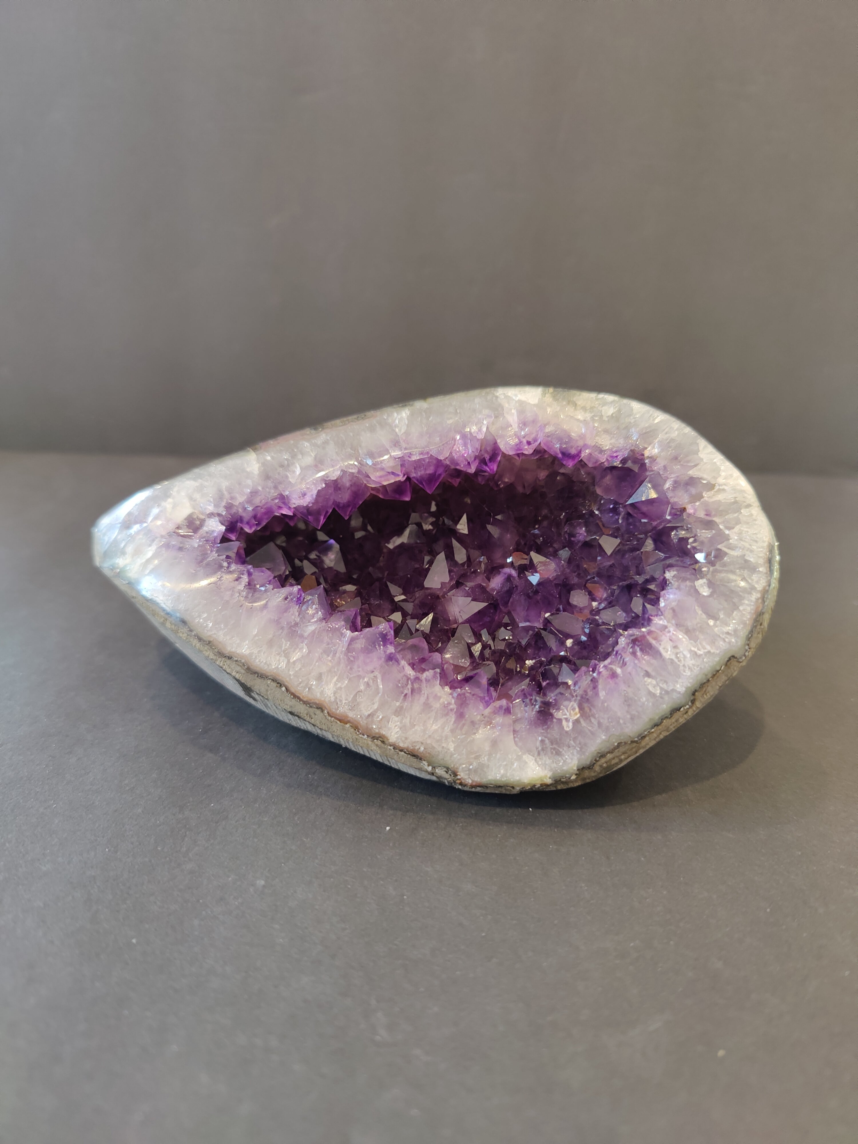 Amethyst Geode Sculpture showing polished edges and violet crystal interior