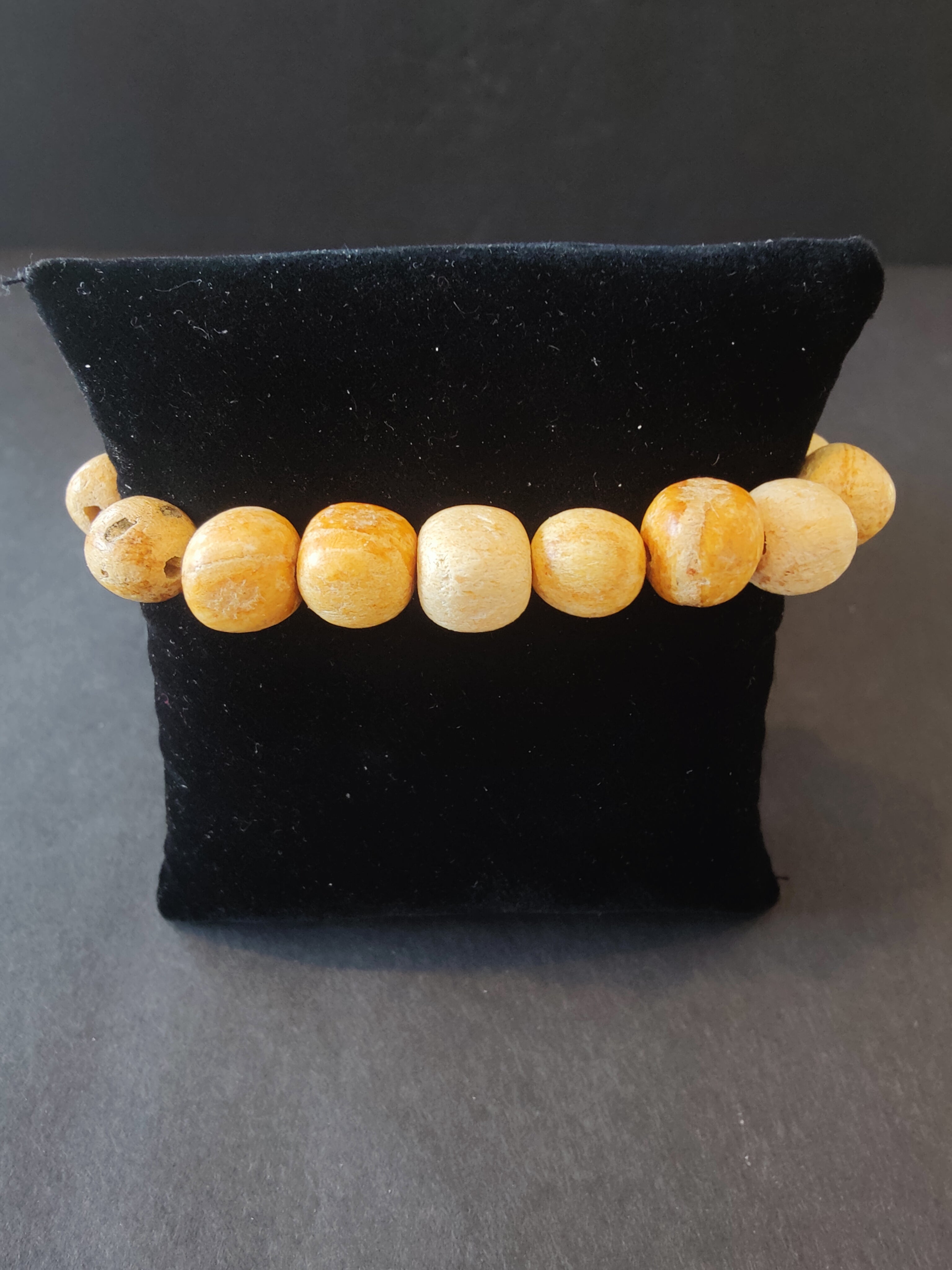 Palo Santo Wood Beaded Bracelet showing round 8mm beads on a wrist