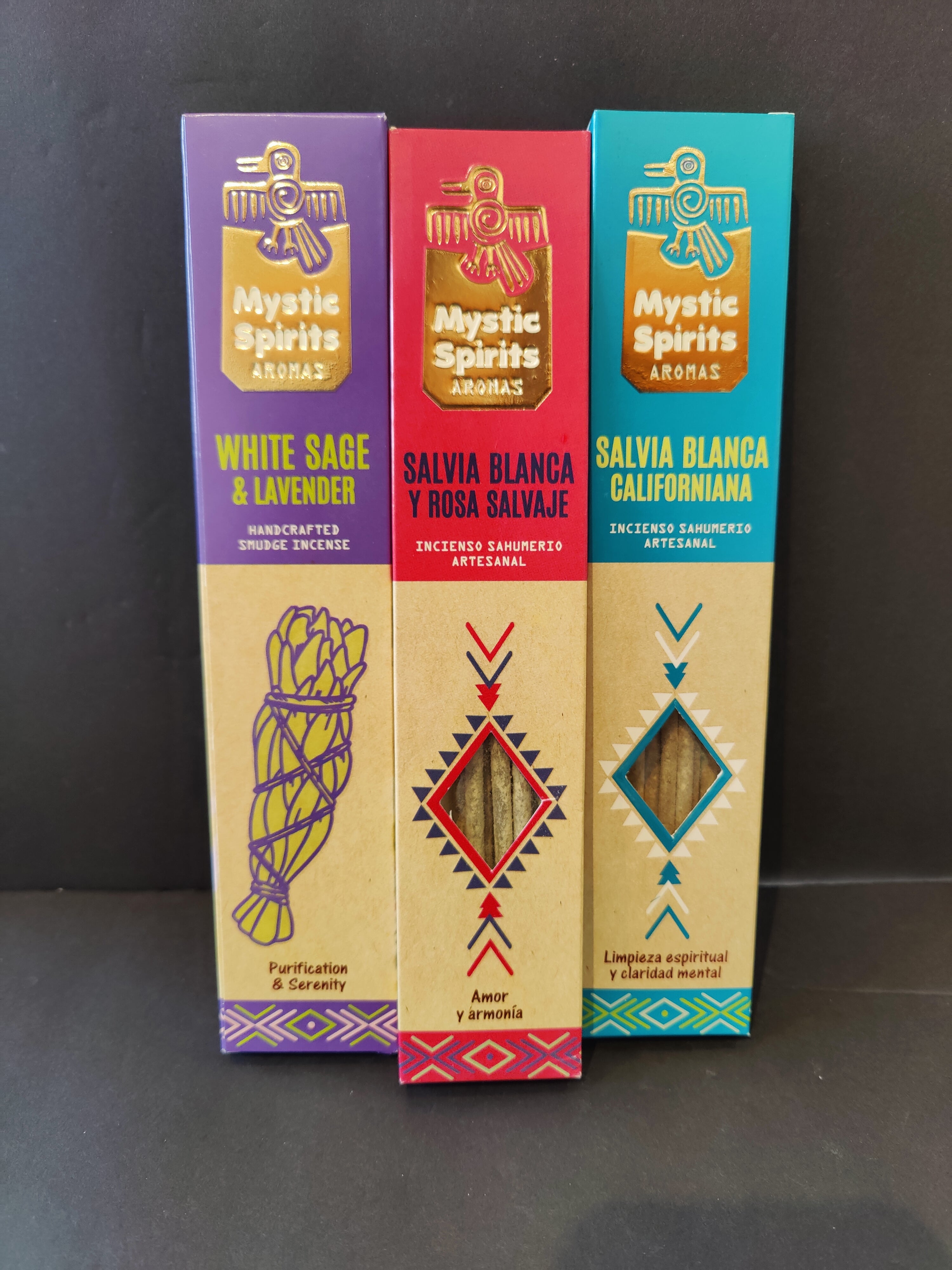 Mystic Spirits White Sage Smudge Incense package with sticks visible laid out on a dark surface