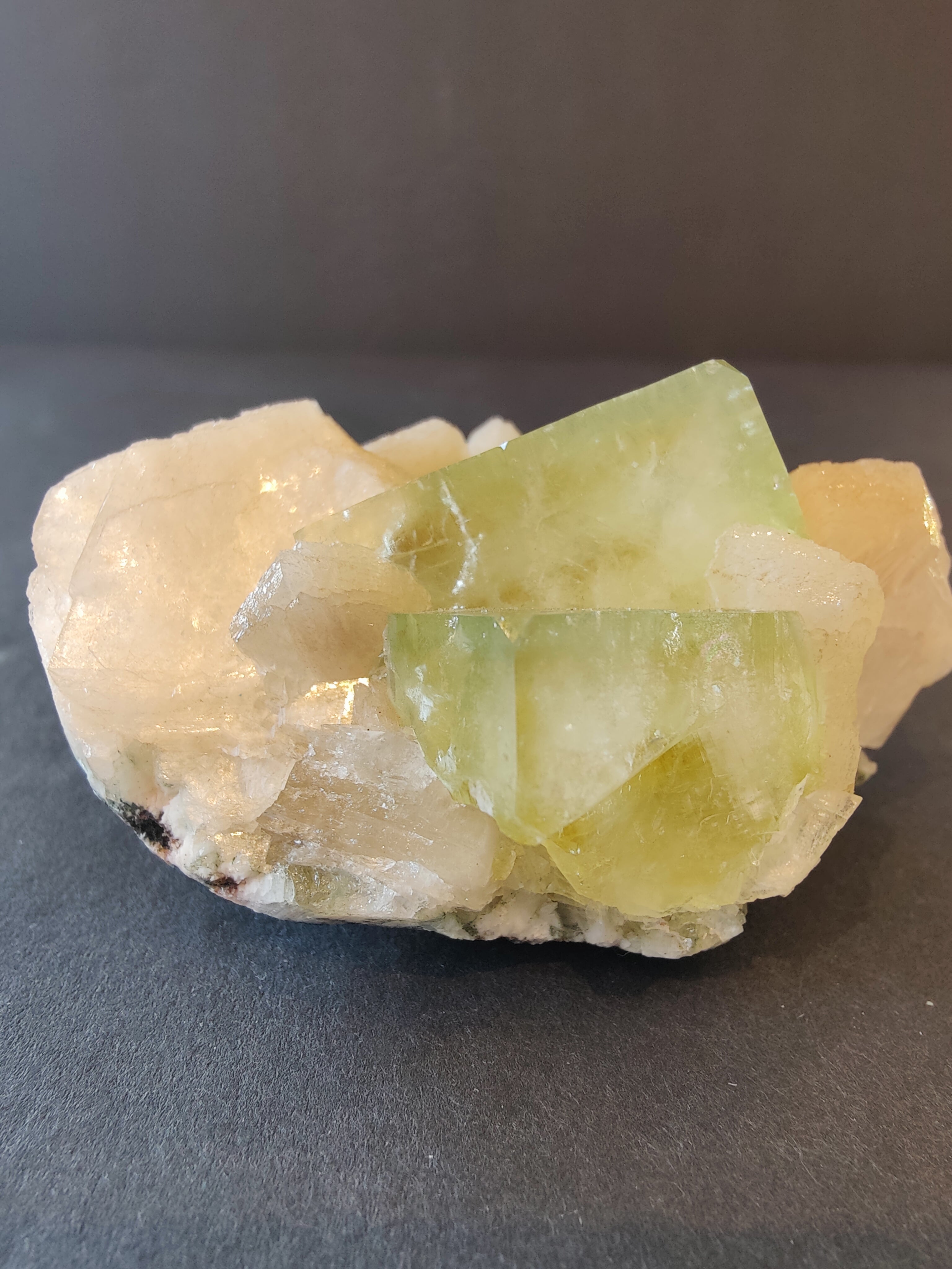 Green Apophyllite cubes with peach Stilbite crystals on matrix from Nashik, India