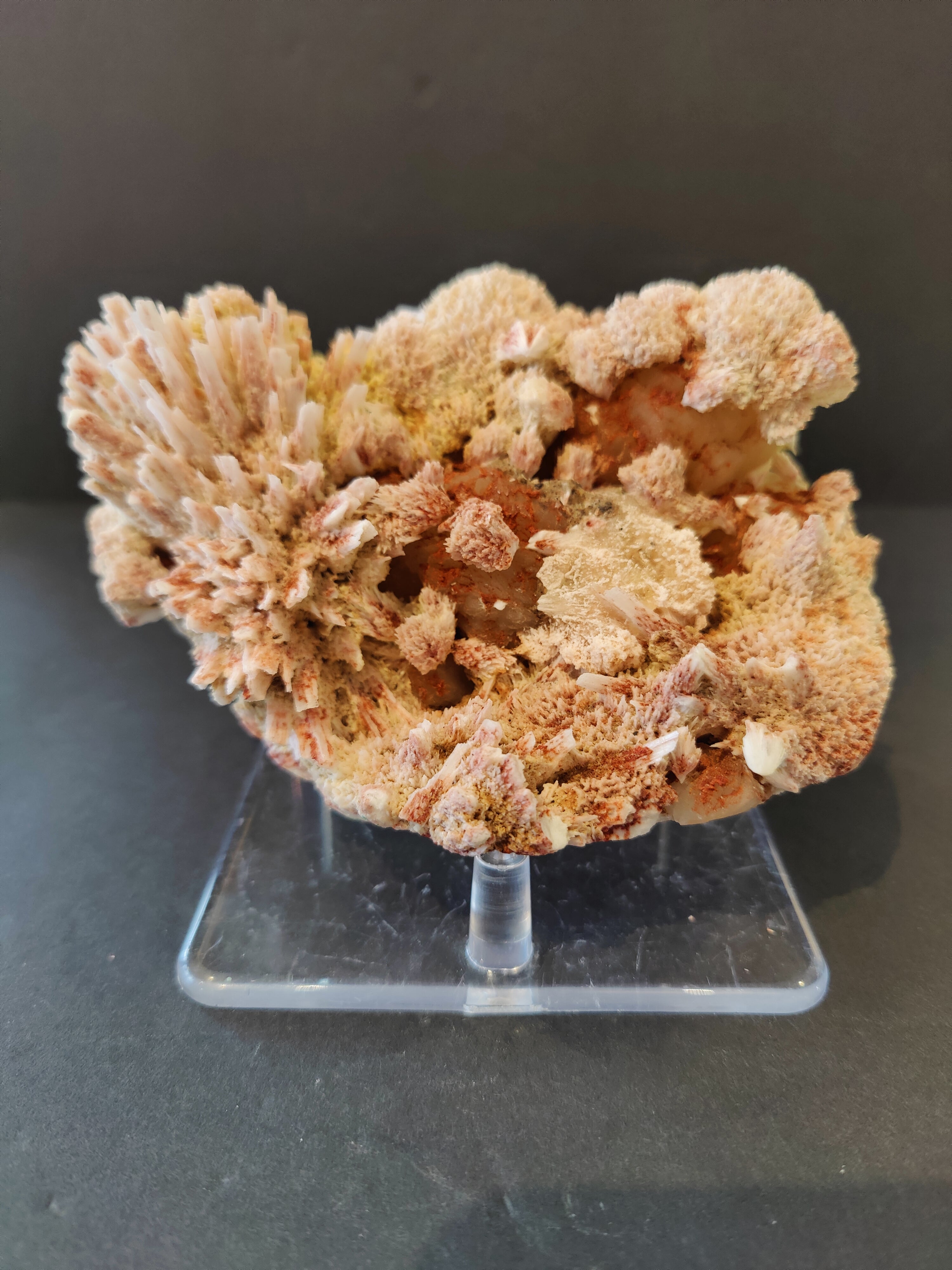 Red Mordenite with Stilbite mineral specimen showing red crystals on matrix