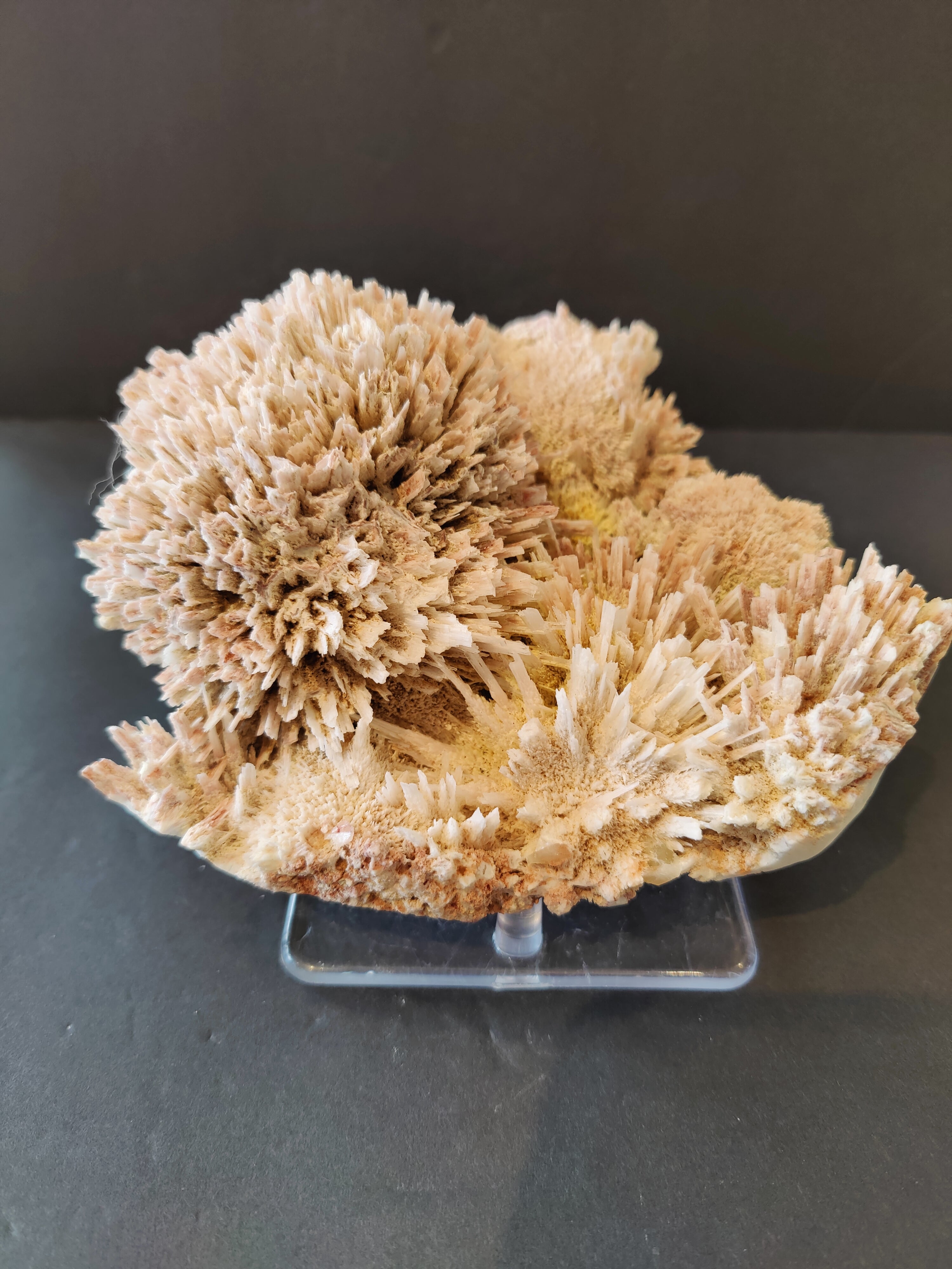 Red mordenite and stilbite specimen on matrix with crystalline formations